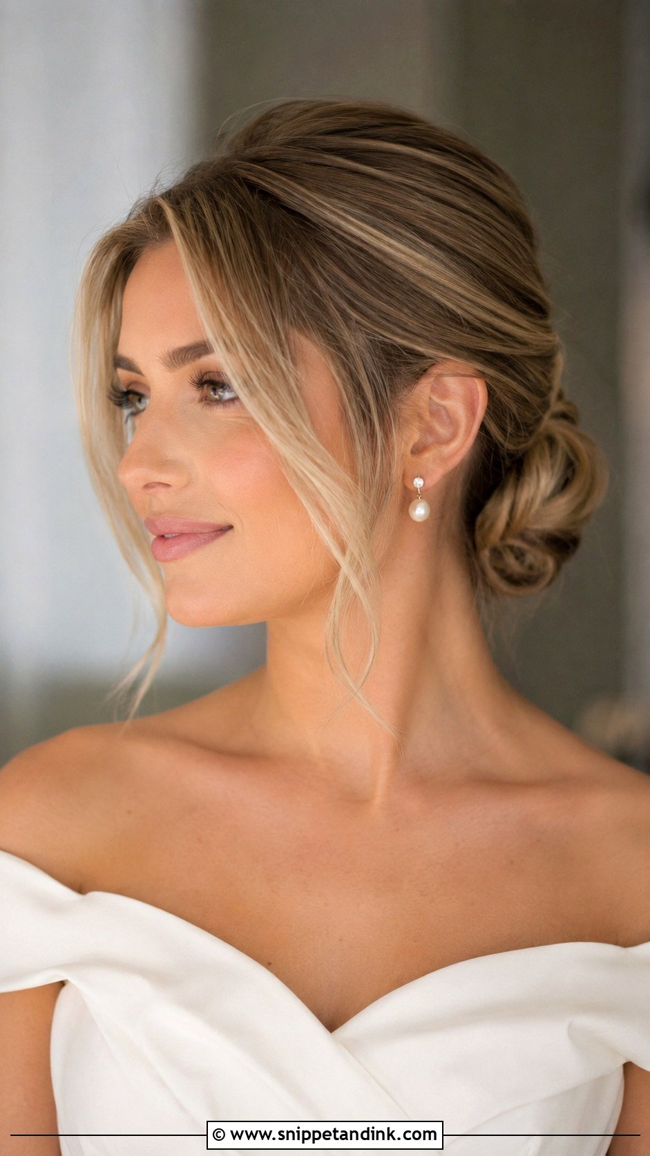 Classic Low Bun With Chunky Face Frame - Snippet and Ink - 20 Bridal Hair Front View Ideas