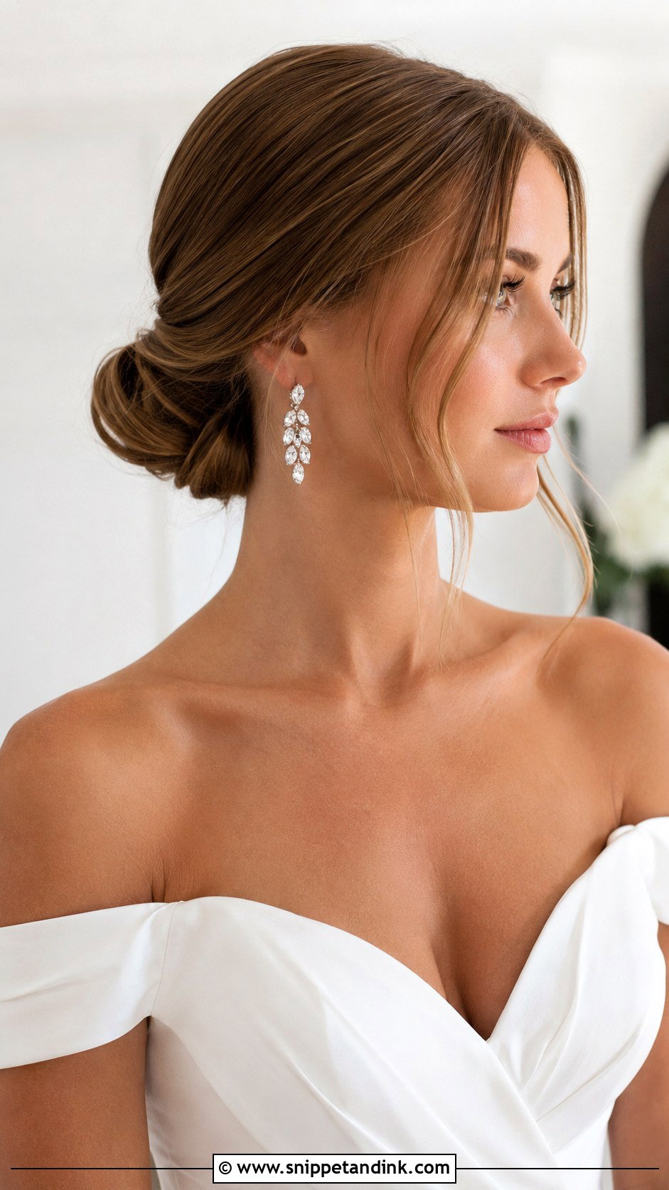 Classic Sleek Low Bun - Snippet and Ink - 25 Low Bun Wedding Hair Front View Ideas