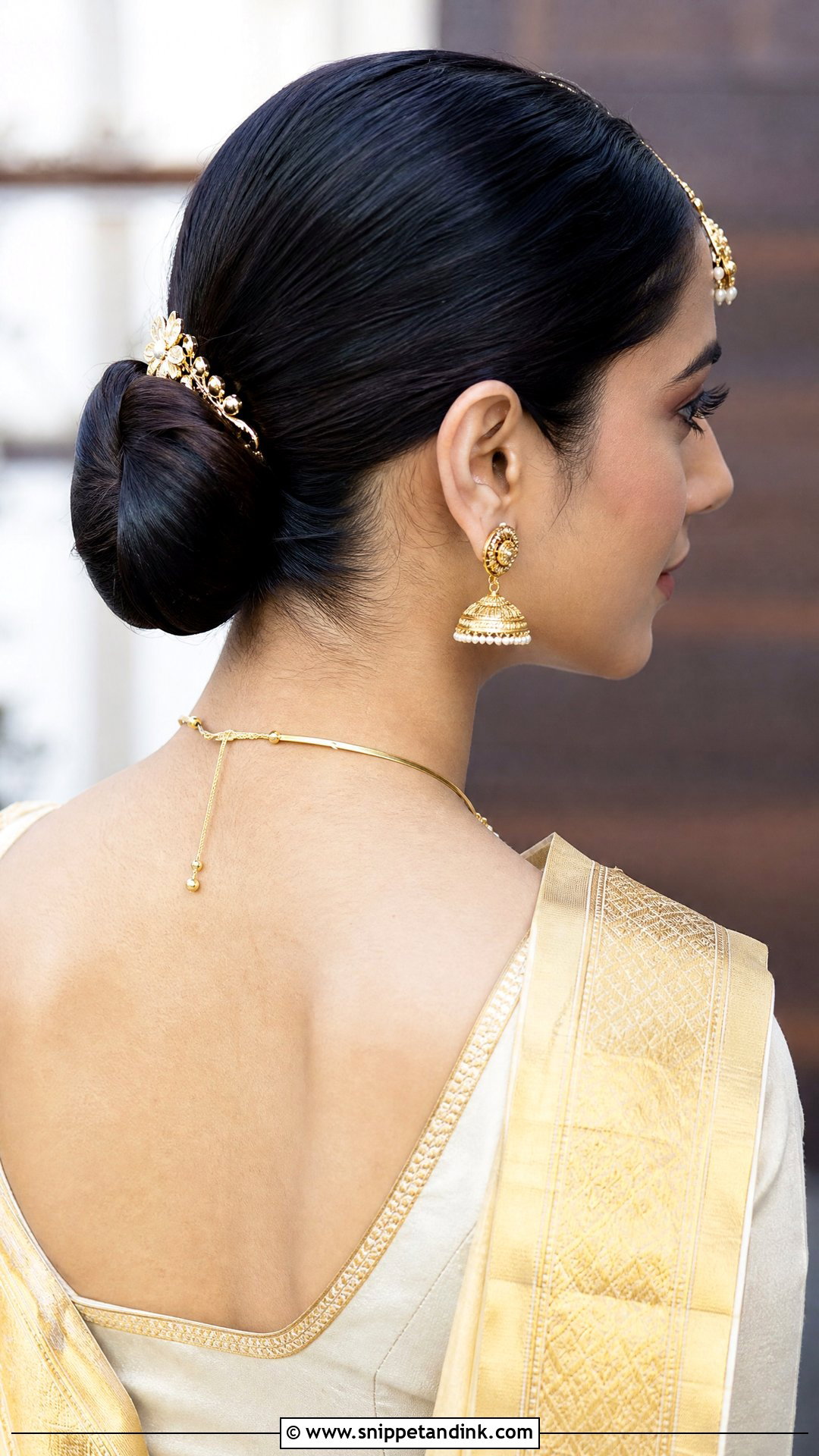 Classic Sleek Low Bun - Snippet and Ink - 20 Hindu Wedding Hairstyles