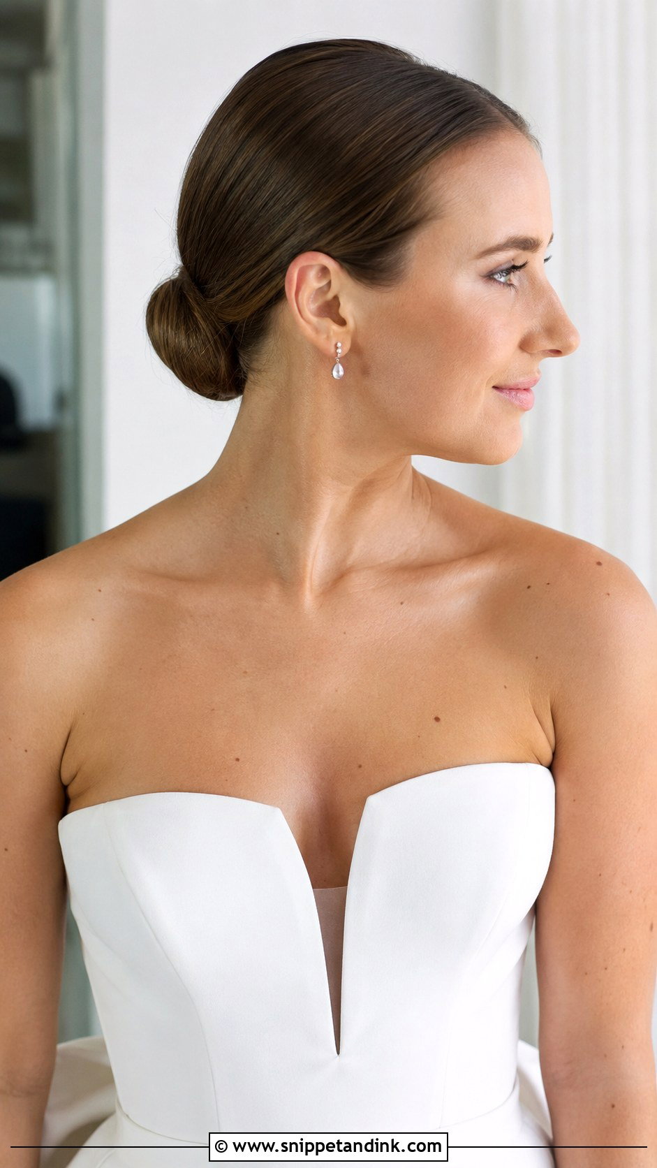 Classic Slicked Back Low Bun - Snippet and Ink - 20 Slicked Back Bun Wedding Hair Ideas