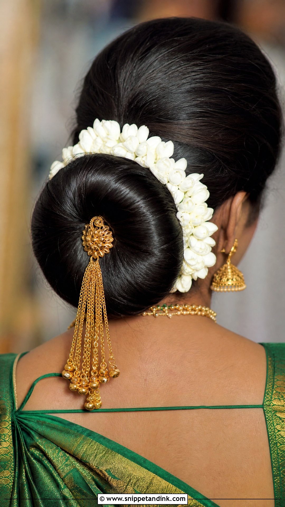 Coiled Bun With Kunjalam - Snippet and Ink - 20 Tamil Bridal Hairstyles