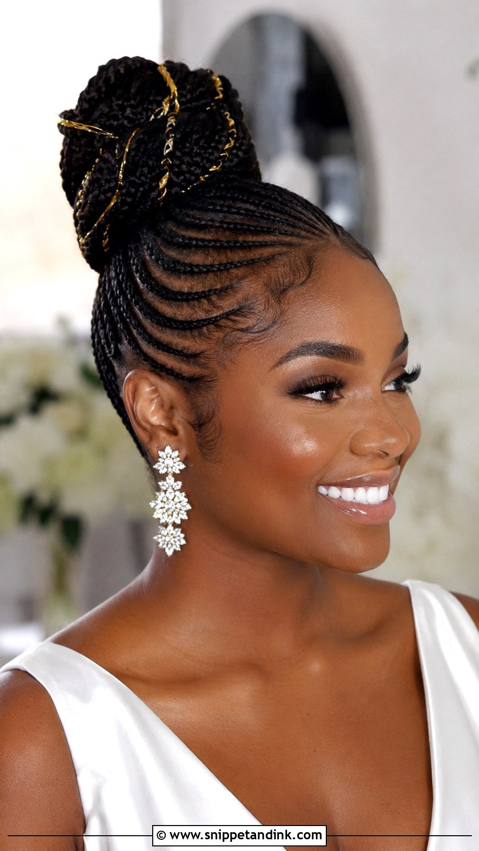 Cornrow Bun Updo - Snippet and Ink - 25 Natural Hair Updo Wedding Ideas