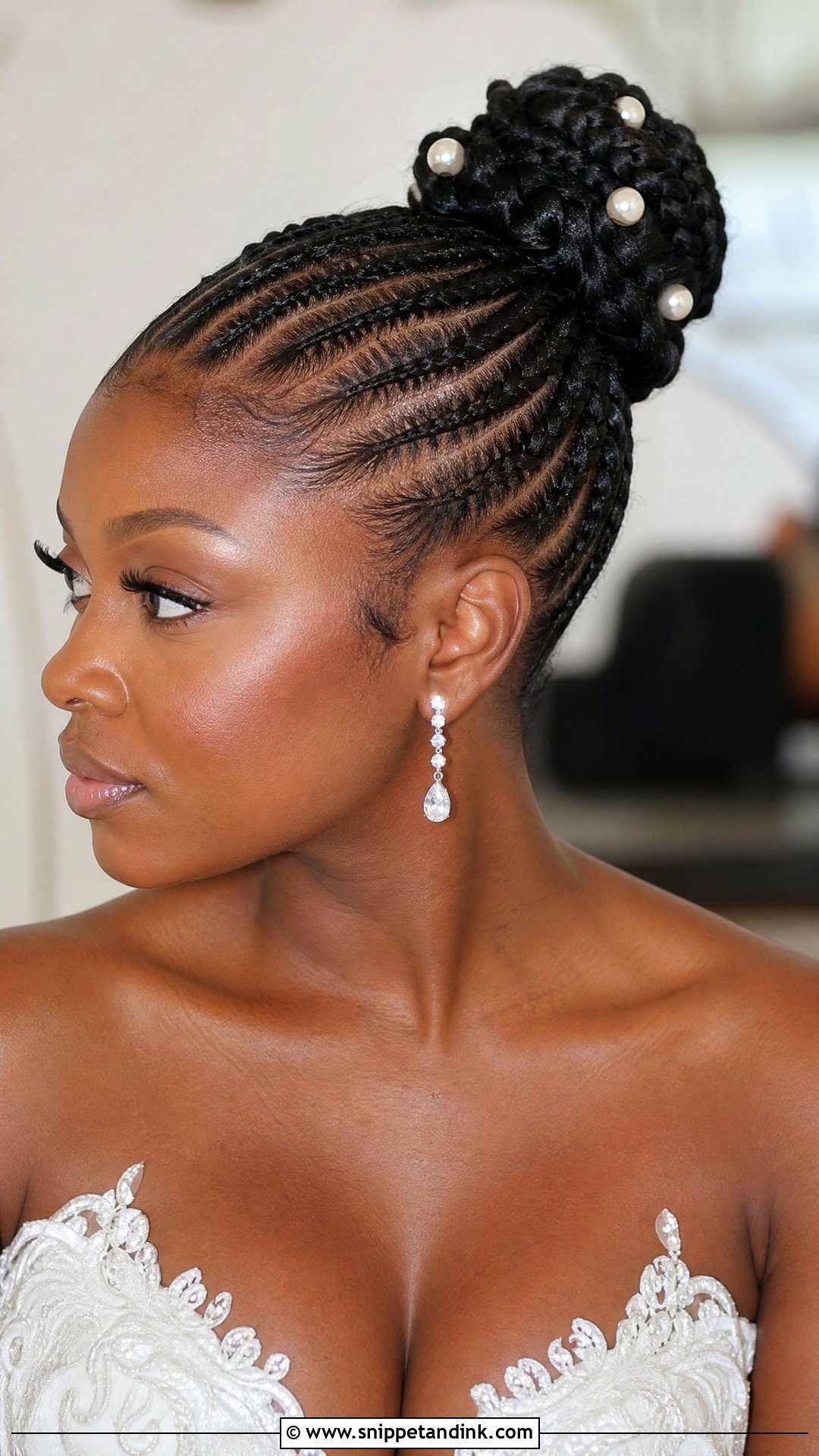 Cornrow Bun With Sleek Finish - Snippet and Ink - 20 Wedding Bun Hairstyles for Black Women