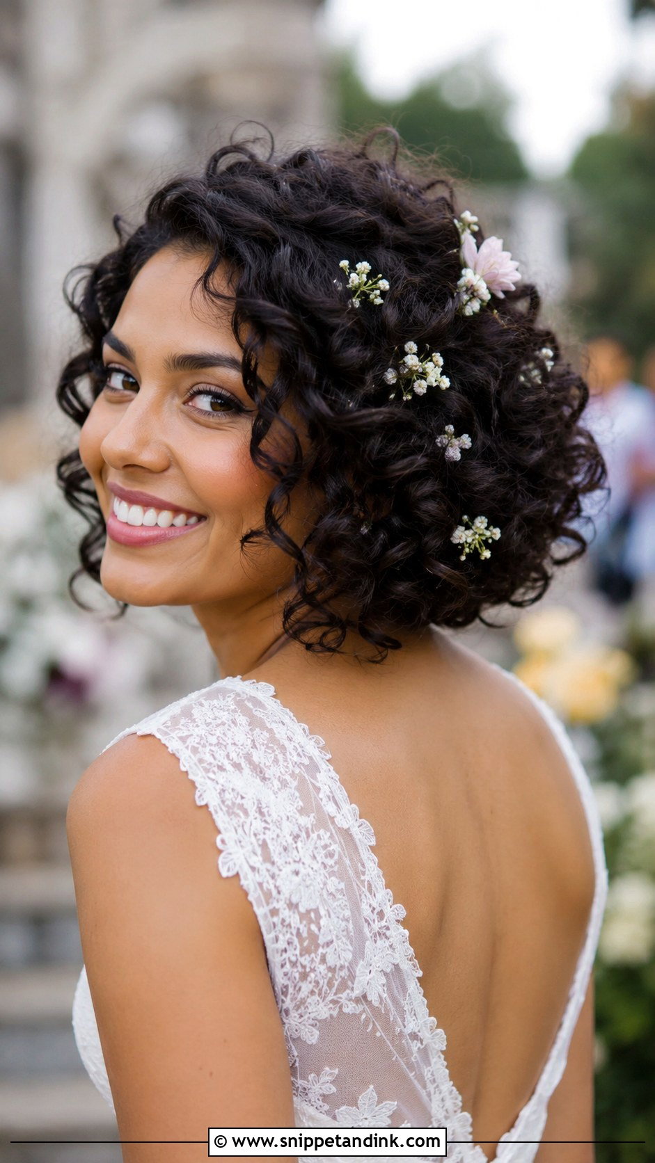Curly Bob With Floral Pins - Snippet and Ink - 30 Bob Wedding Hairstyles