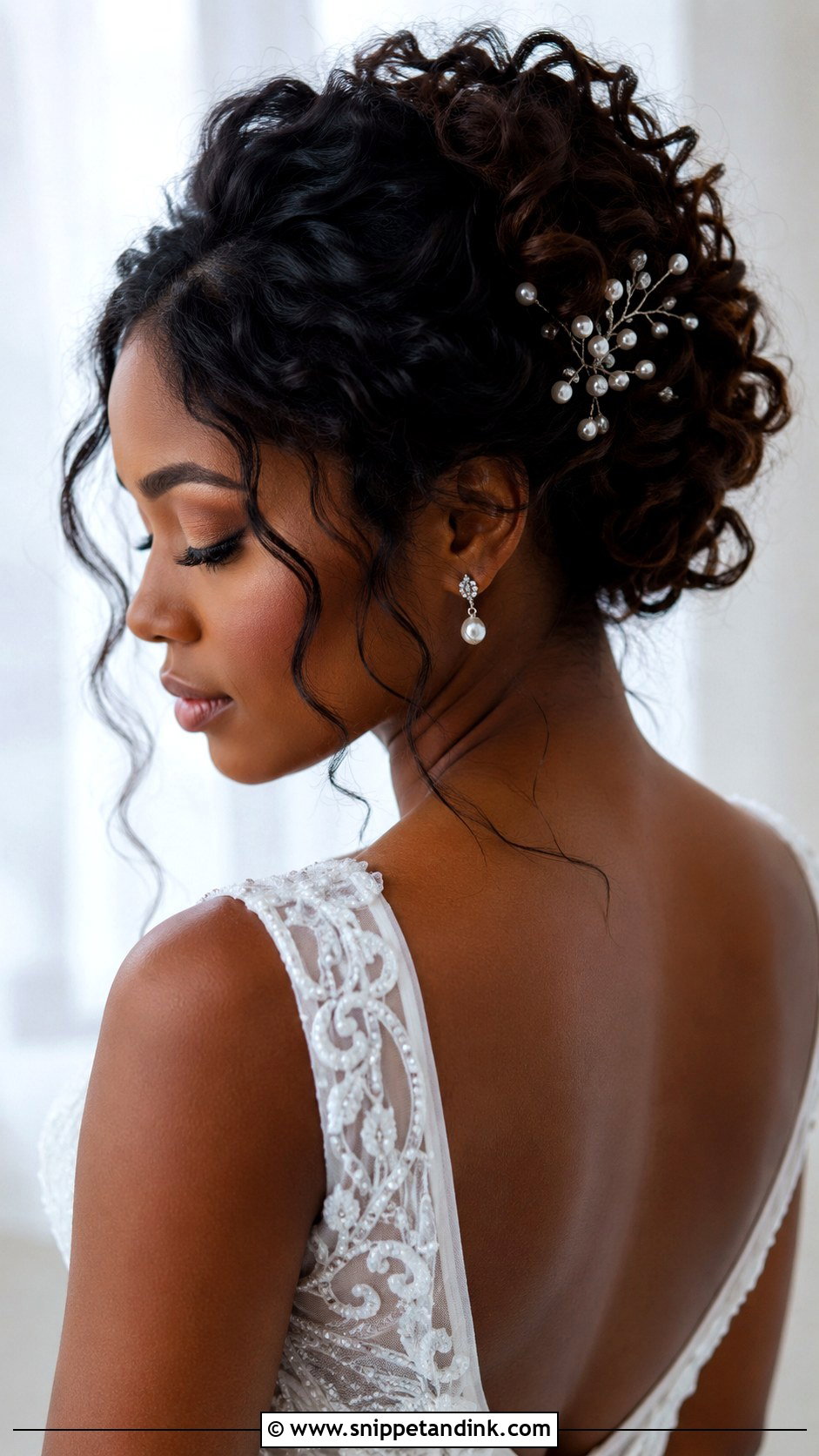 Curly Bridal Bun - Snippet and Ink - 25 Afro Wedding Hairstyles