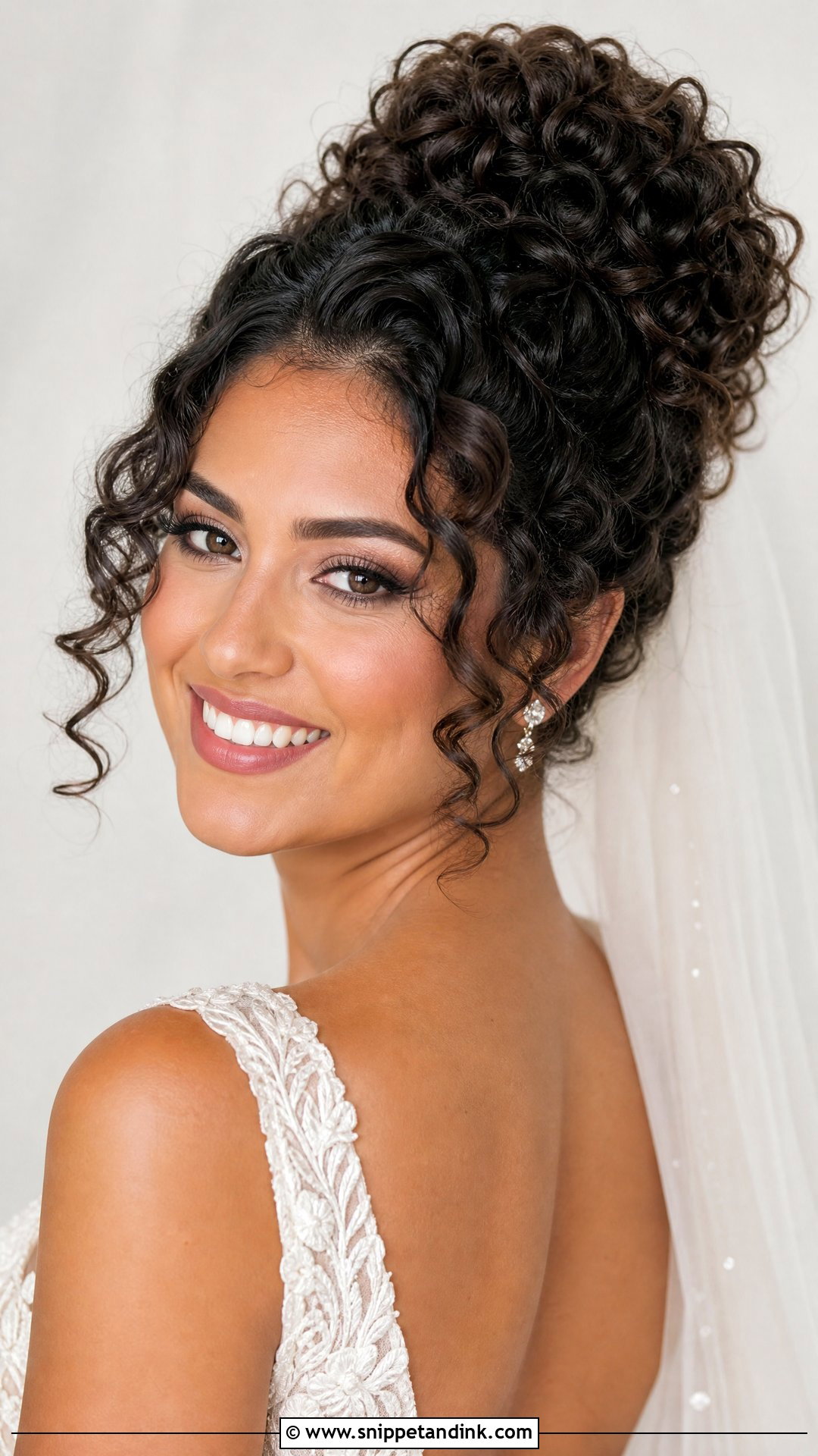 Curly Bridal High Bun - Snippet and Ink - 15 Bridal High Bun Hairstyles