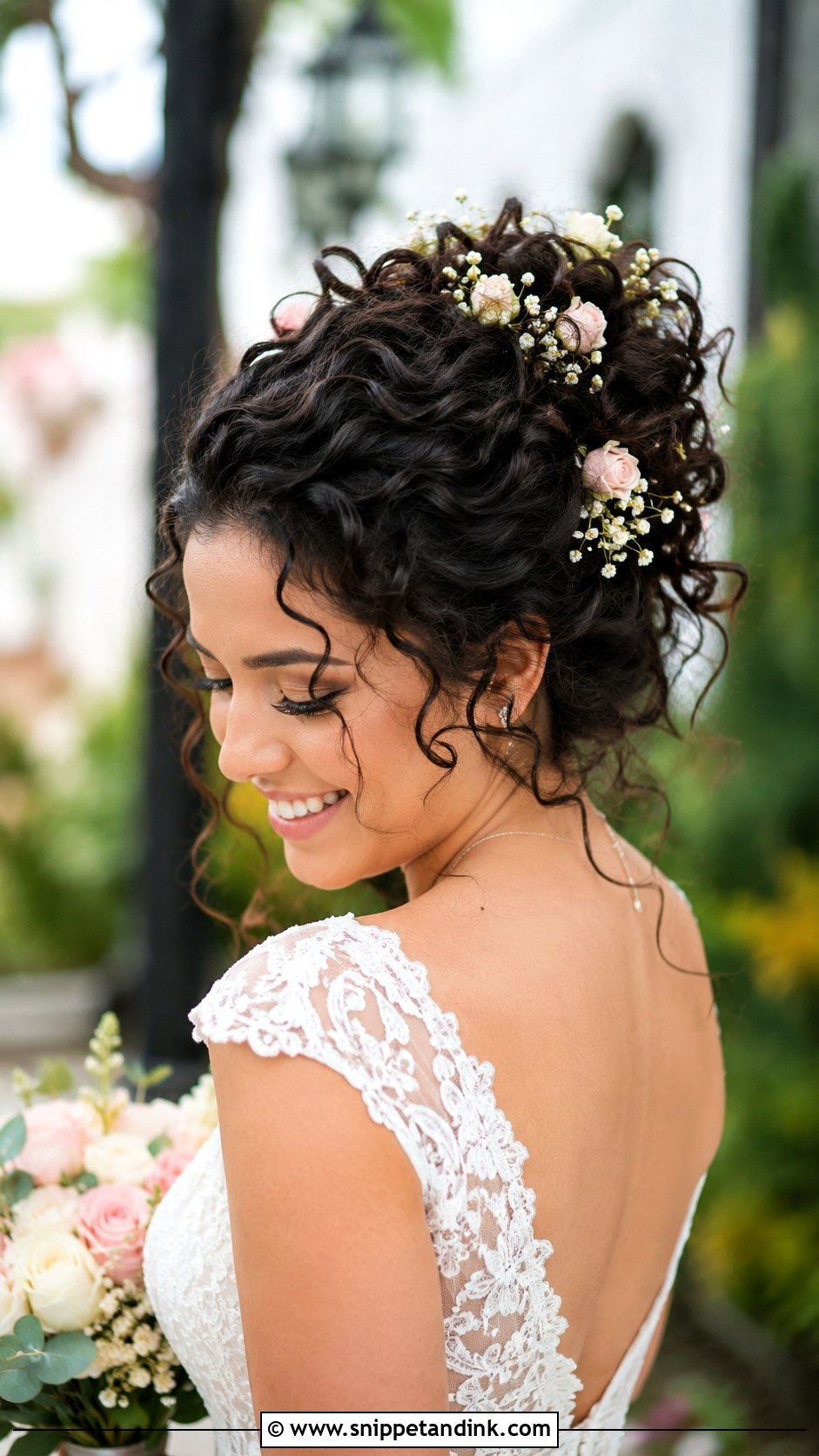 Curly Bridal Updo With Flowers - Snippet and Ink - 20 Simple Curly Wedding Hairstyles