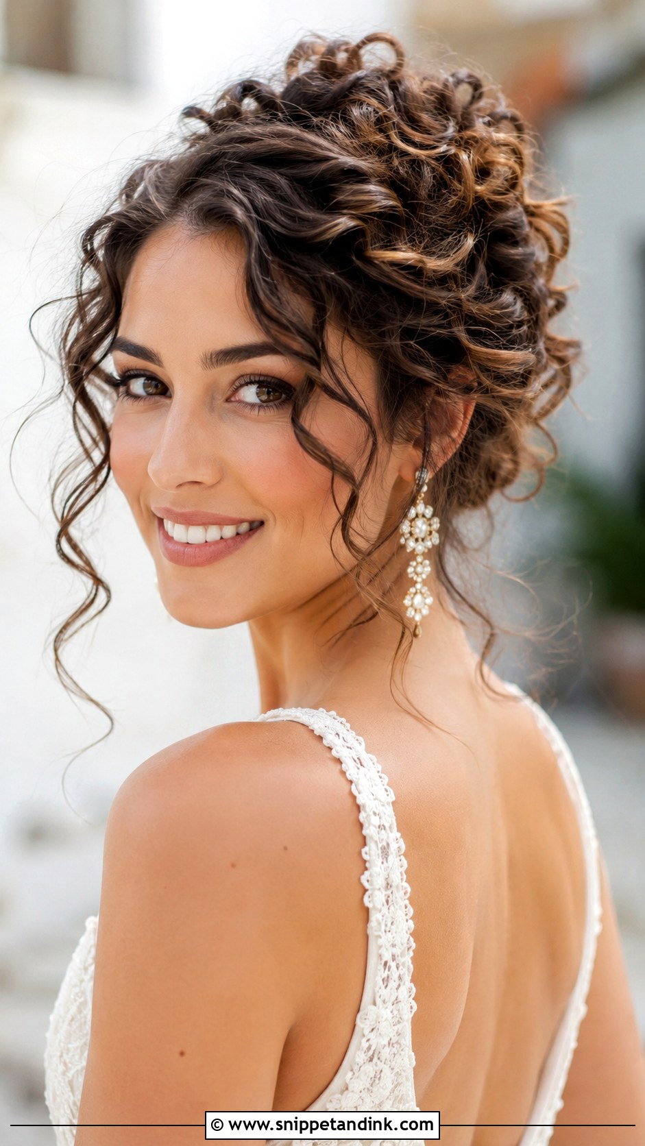 Curly Bridal Updo With Loose Tendrils - Snippet and Ink - 30 Curly Bridal Hair Ideas
