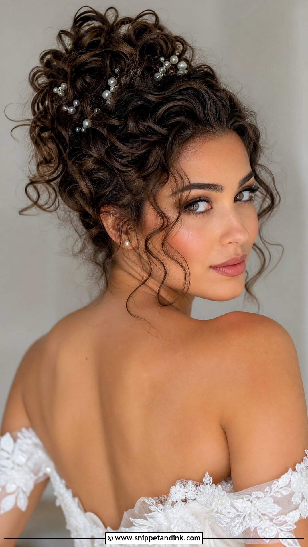 Curly Bridal Updo with Tendrils - Snippet and Ink - 20 Curly Wedding Hairstyle Ideas