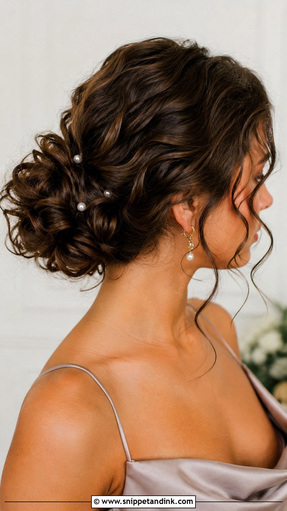 Curly Bridesmaid Low Bun - Snippet and Ink - 25 Curly Bridesmaid Hairstyles