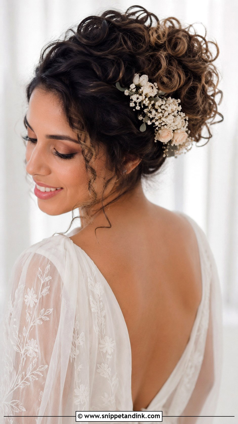 Curly Bun With Floral Accents - Snippet and Ink - 20 Cute Wedding Hairstyles for Short Hair
