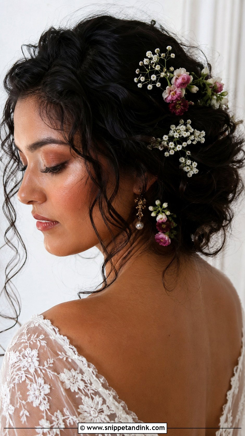 Curly Hair Boho Updo With Flowers - Snippet and Ink - 25 Curly Hair Bridal Hairstyles