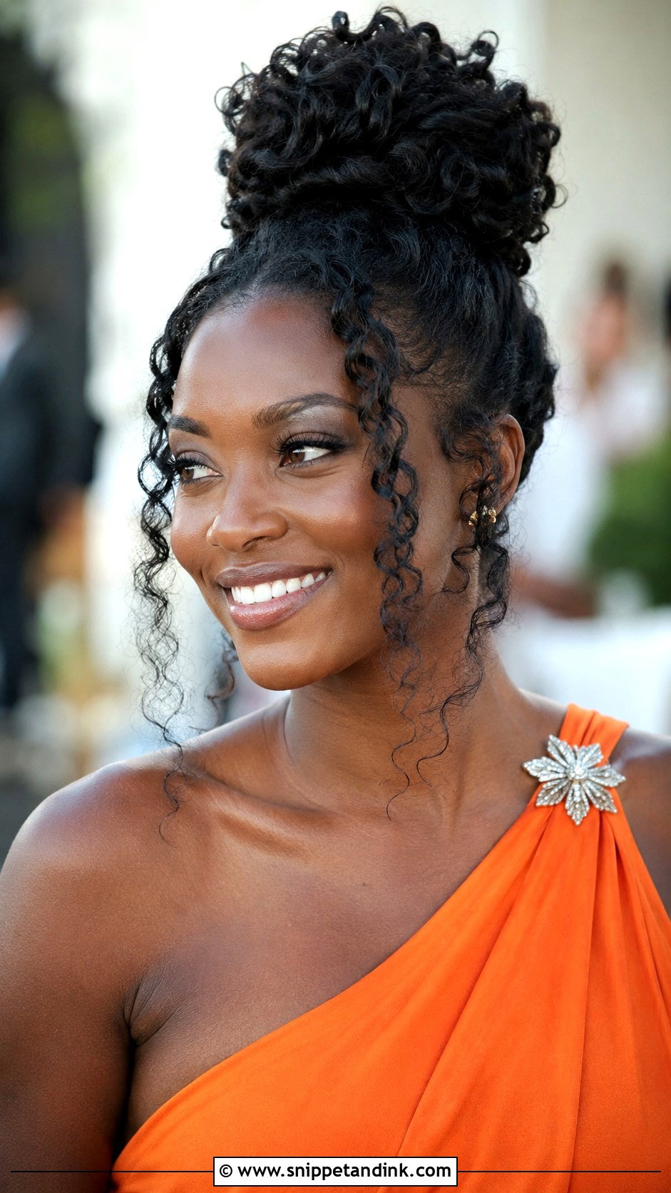 Curly High Bun - Snippet and Ink - 30 Wedding Guest Hairstyles for Long Hair