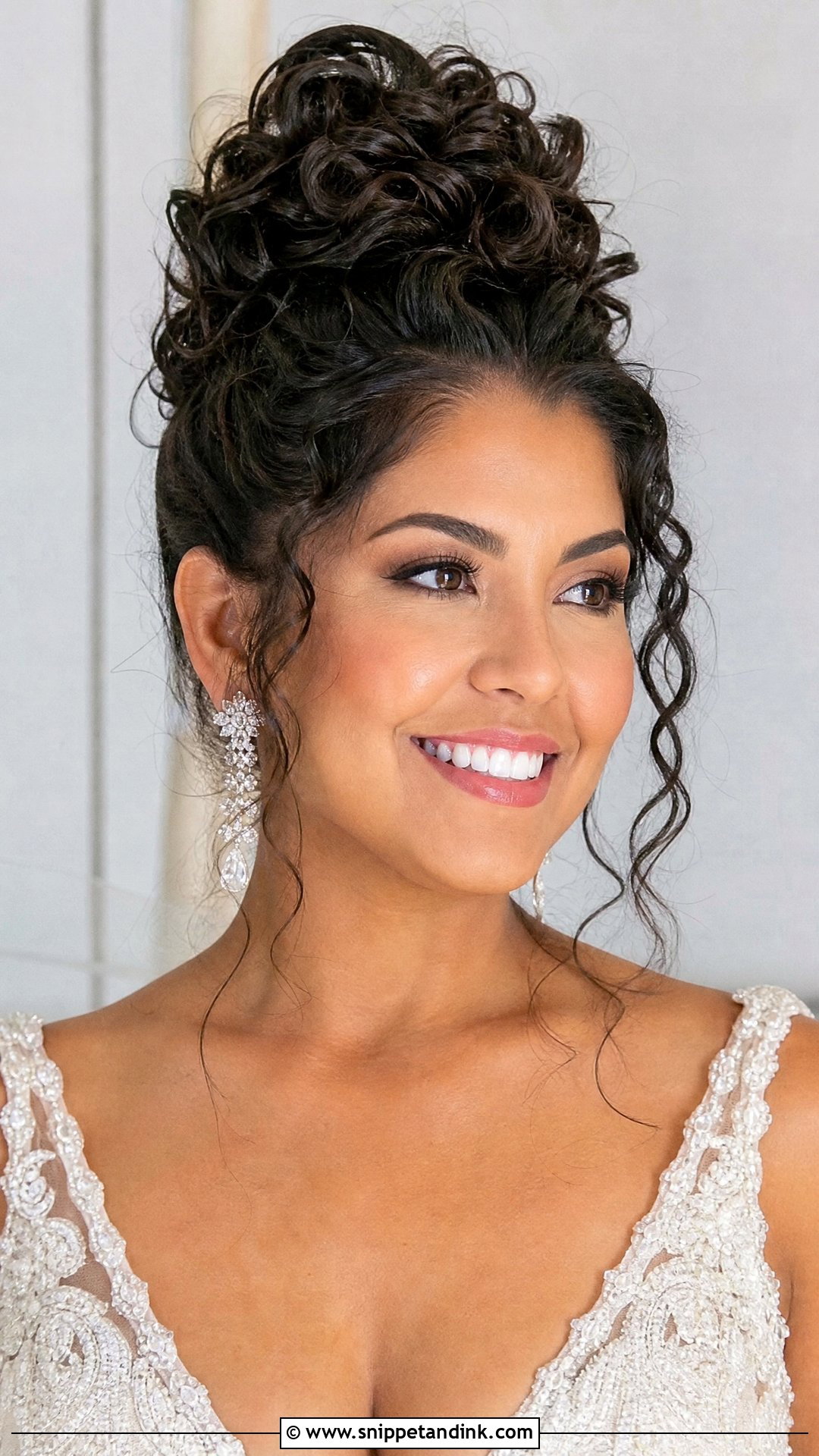 Curly High Bun Wedding Hairstyle - Snippet and Ink - 20 Curly Hair Bride Wedding Day Ideas