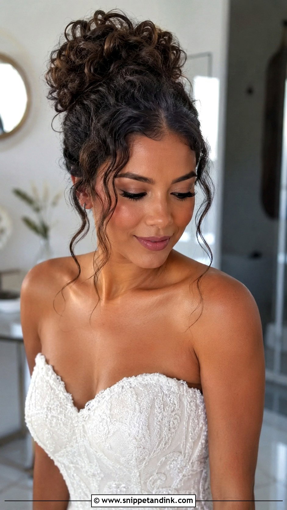 Curly High Bun With Volume - Snippet and Ink - 25 Curly Hair Bride Hairstyles