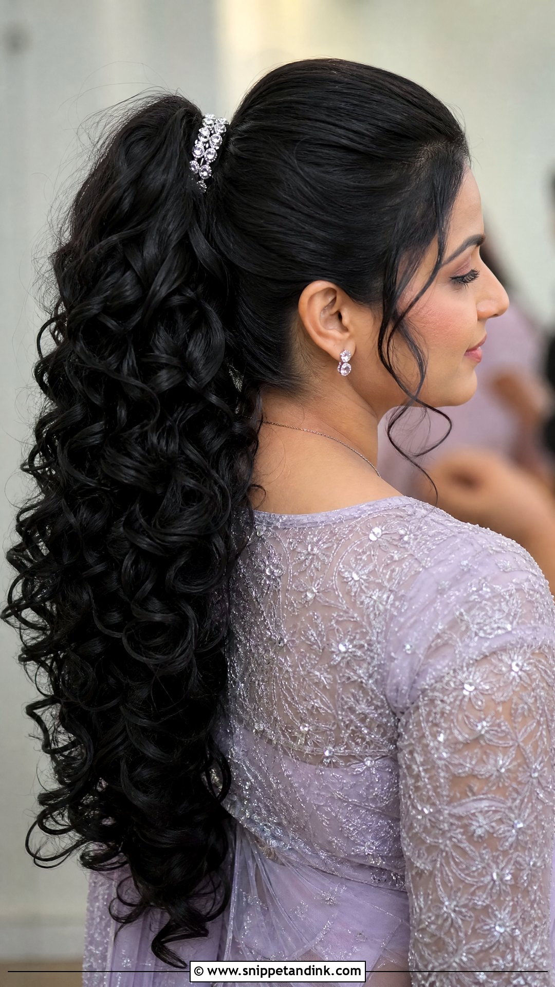 Curly High Ponytail - Snippet and Ink - 20 Easy Indian Hairstyles for Wedding Guest