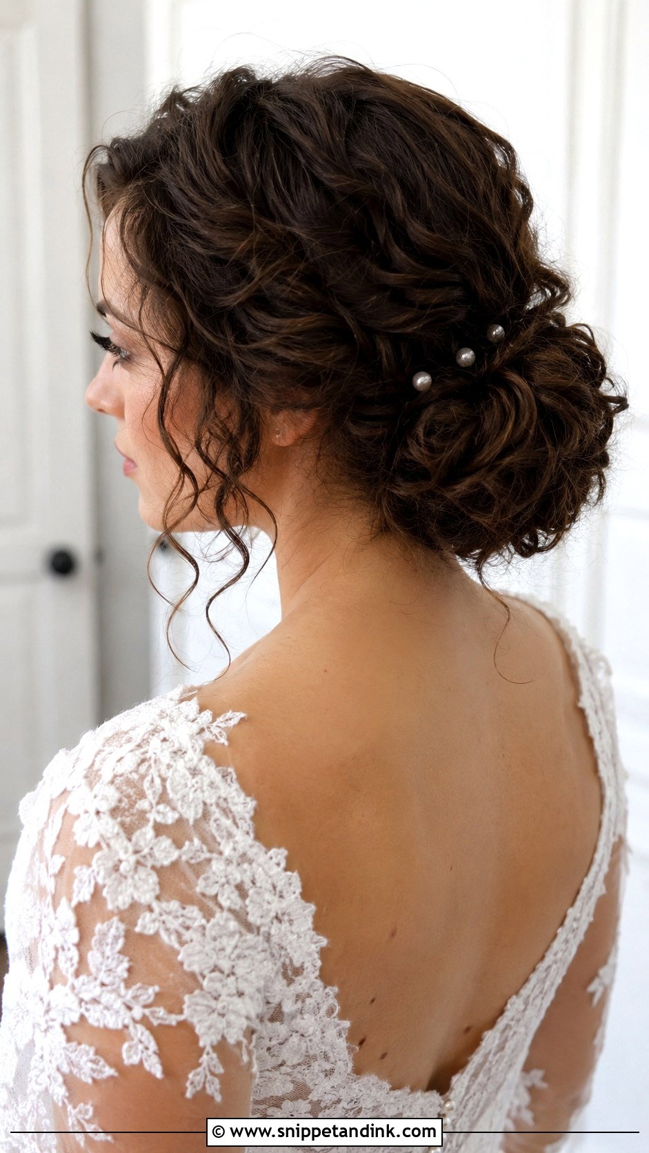 Curly Low Bun Bridal Updo - Snippet and Ink - 25 Curly Hair Bridal Hairstyles
