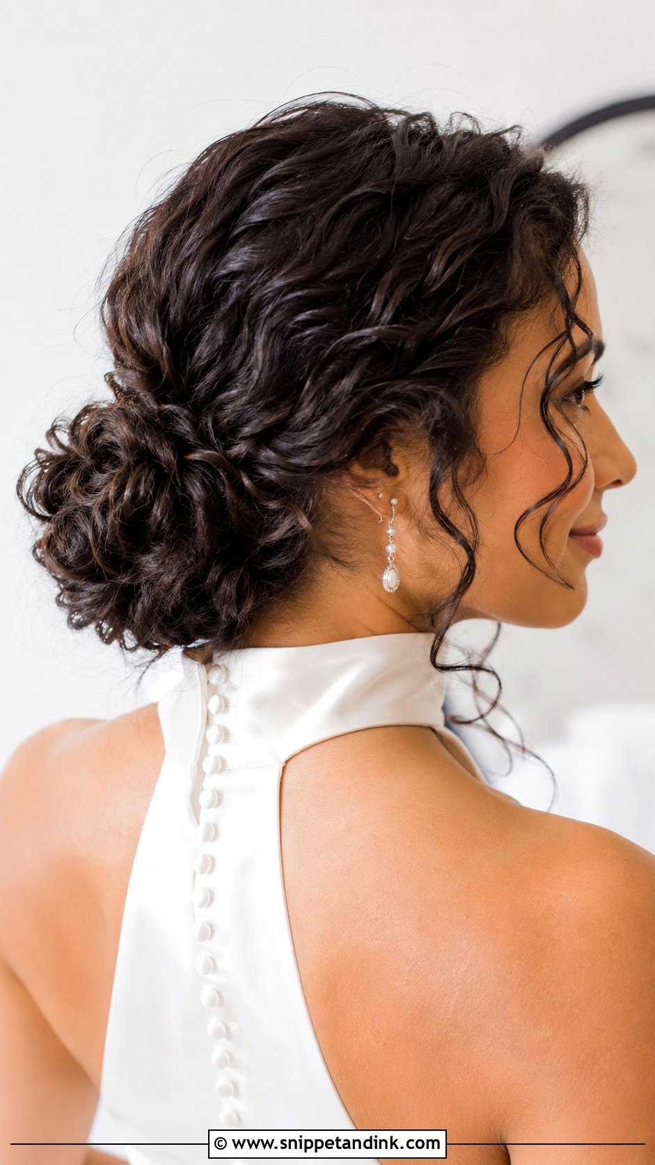 Curly Low Bun Wedding Hairstyle - Snippet and Ink - 20 Natural Curly Hairstyles for Wedding