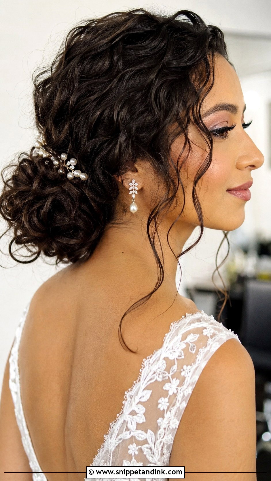 Curly Low Bun Wedding Hairstyle - Snippet and Ink - 25 Curly Bridal Hairstyles