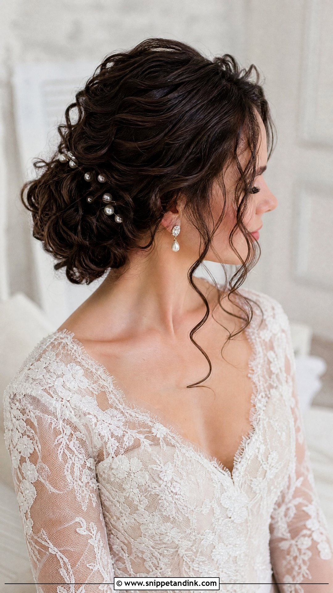 Curly Low Bun Wedding Updo - Snippet and Ink - 20 Long Curly Hair Wedding Styles