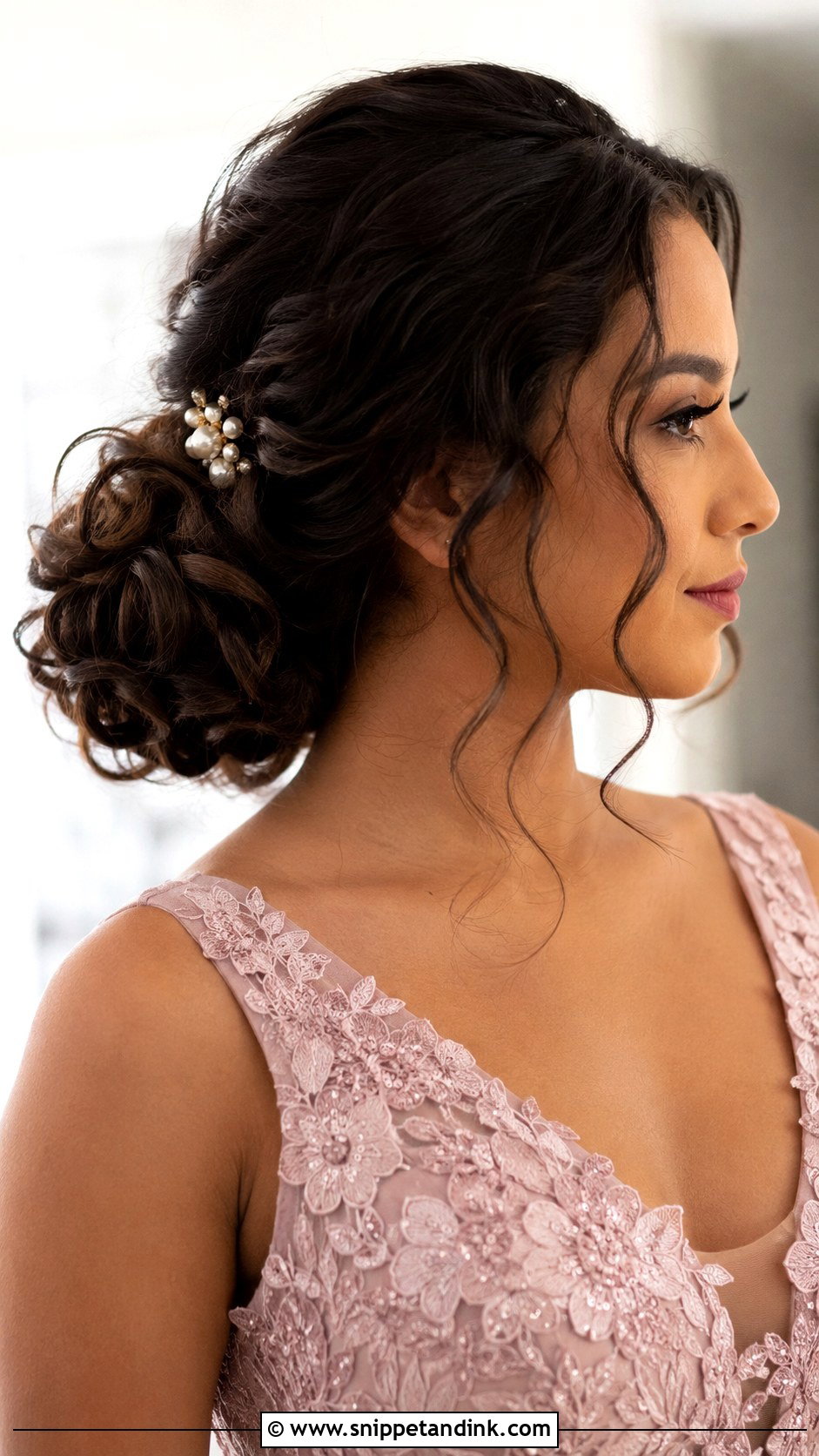 Curly Low Bun for Wedding Guest - Snippet and Ink - 25 Curly Hair Hairstyles for Wedding Guest