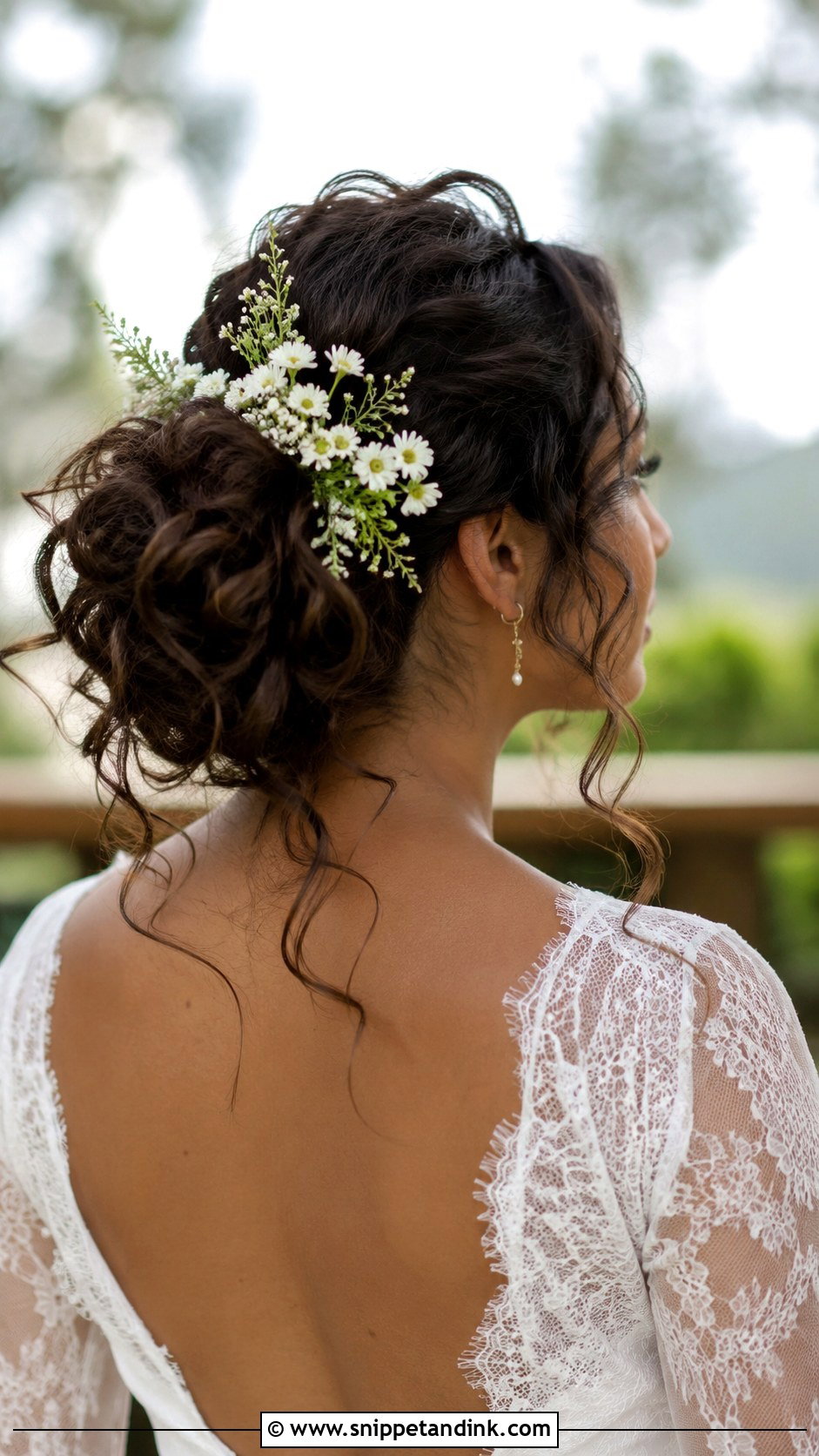 Curly Messy Bun With Loose Pieces - Snippet and Ink - 30 Curly Hair Wedding Styles