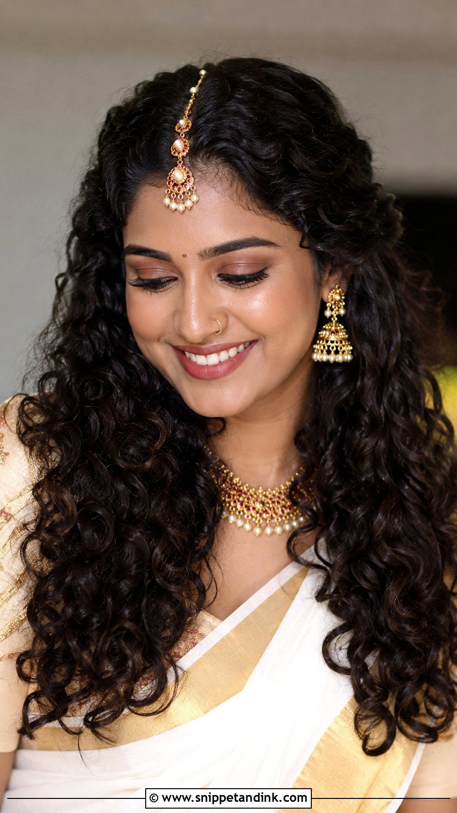 Curly Open Hair With Maang Tikka - Snippet and Ink - 30 Kerala Bride Hairstyles