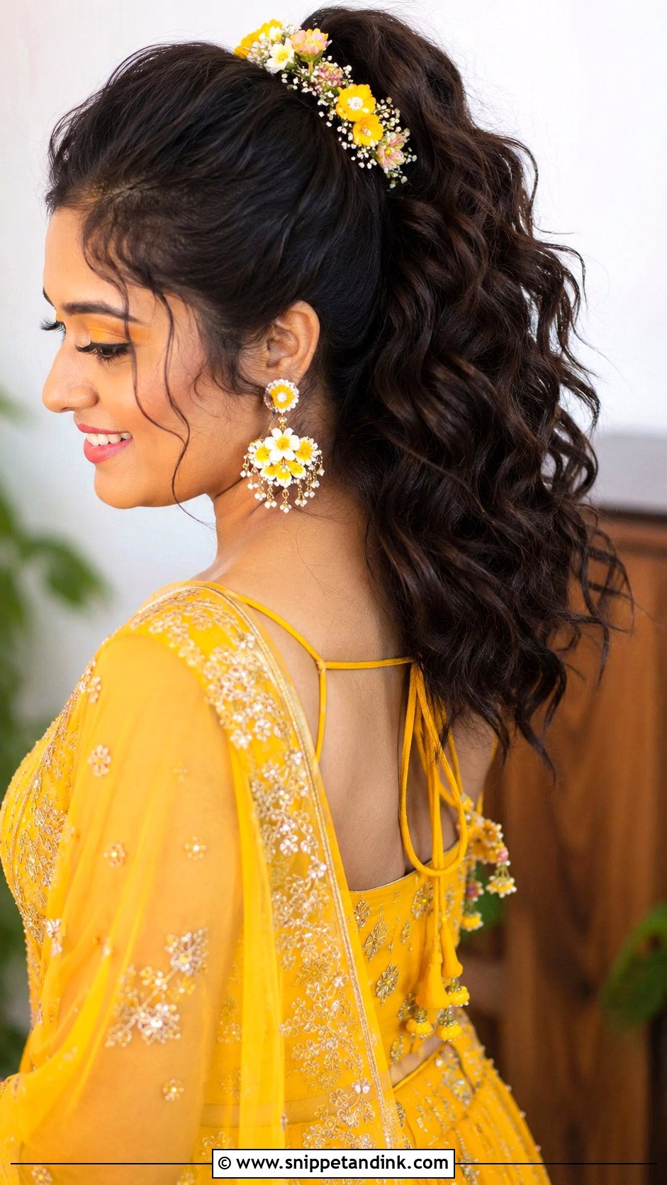 Curly Ponytail With Flowers - Snippet and Ink - 25 Haldi Ceremony Hairstyle for Bride Ideas