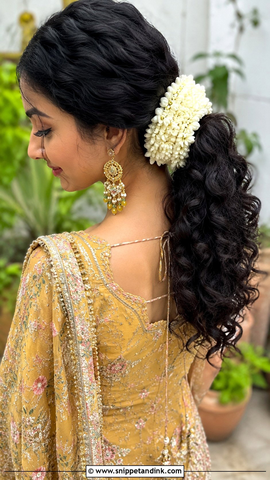 Curly Ponytail With Gajra - Snippet and Ink - 20 Pakistani Bridal Hairstyles