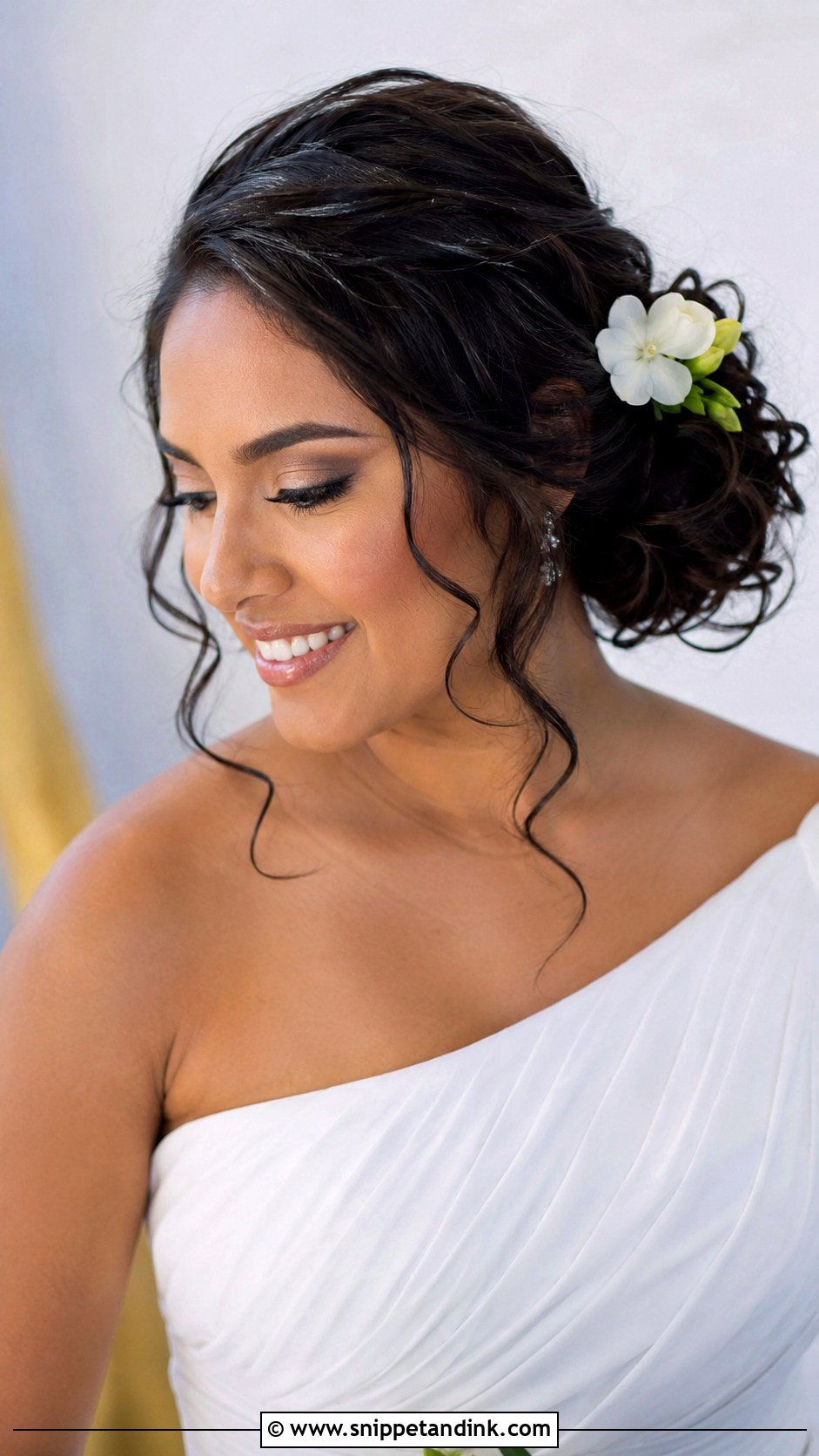 Curly Side Bun - Snippet and Ink - 25 Hair Styles for Short Hair Wedding