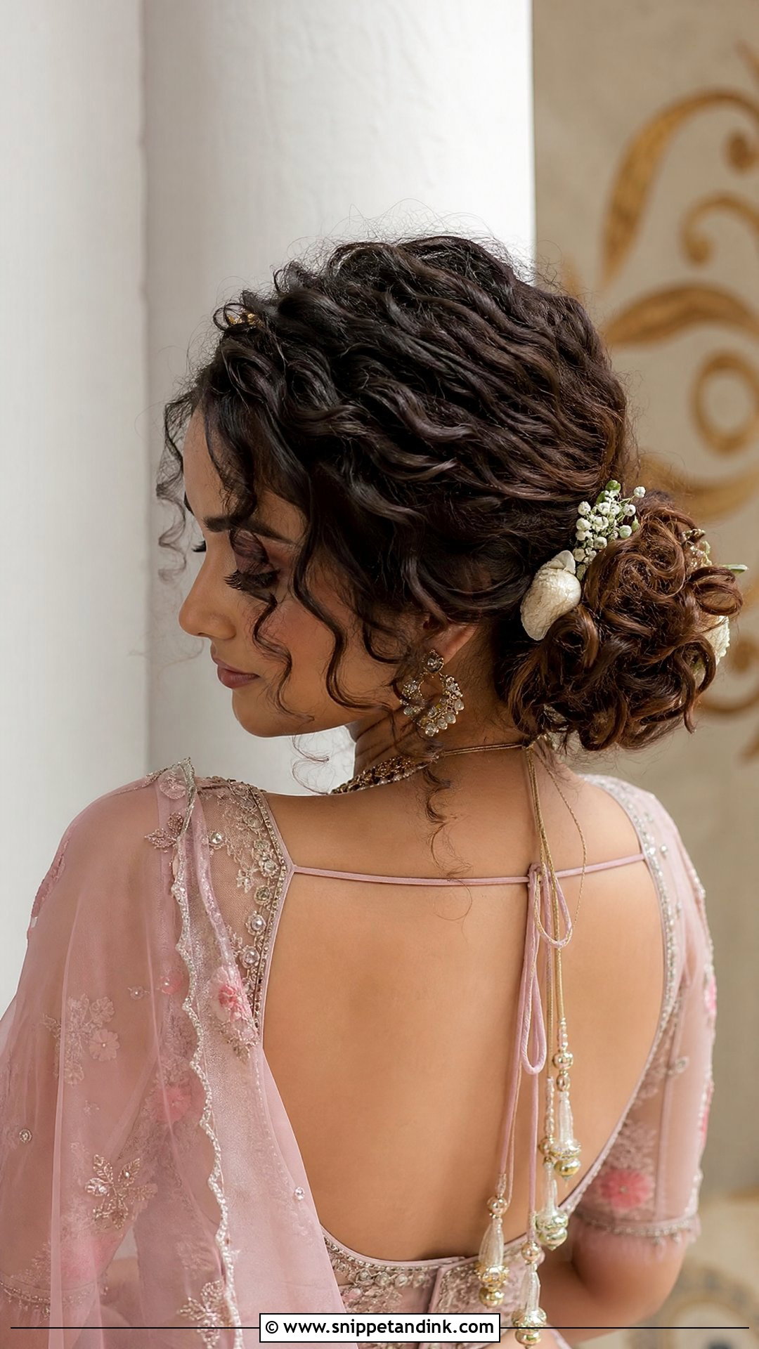 Curly Textured Bun Hairstyle - Snippet and Ink - 20 Indian Wedding Buns Hairstyles