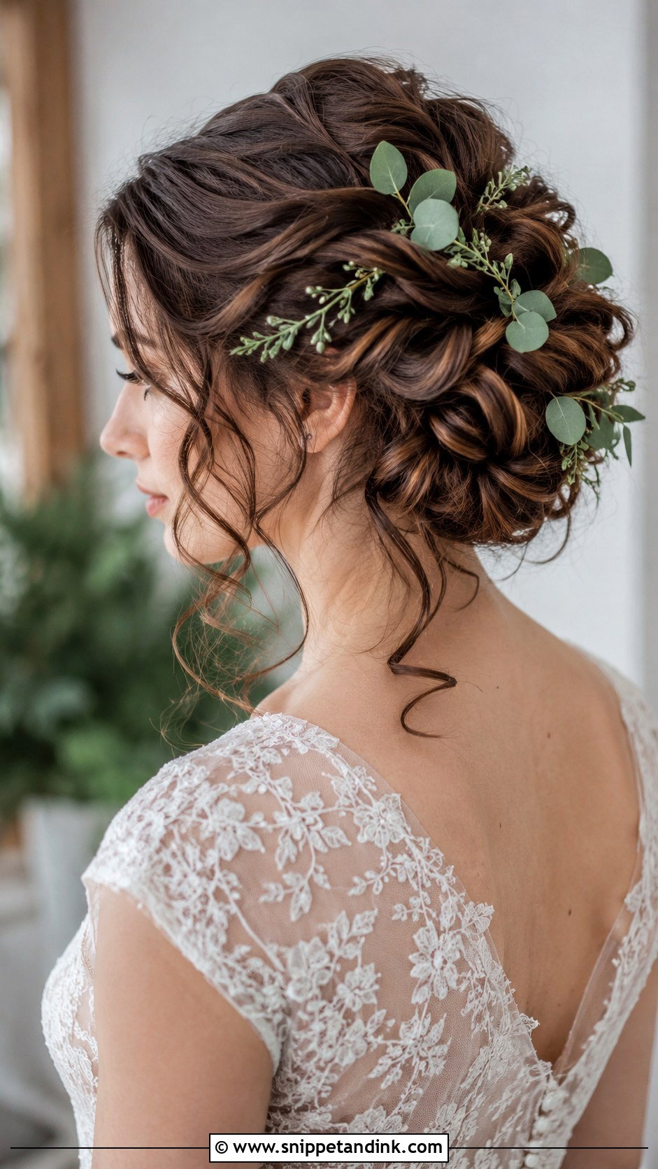 Curly Twisted Updo With Greenery - Snippet and Ink - 30 Curly Hair Wedding Styles