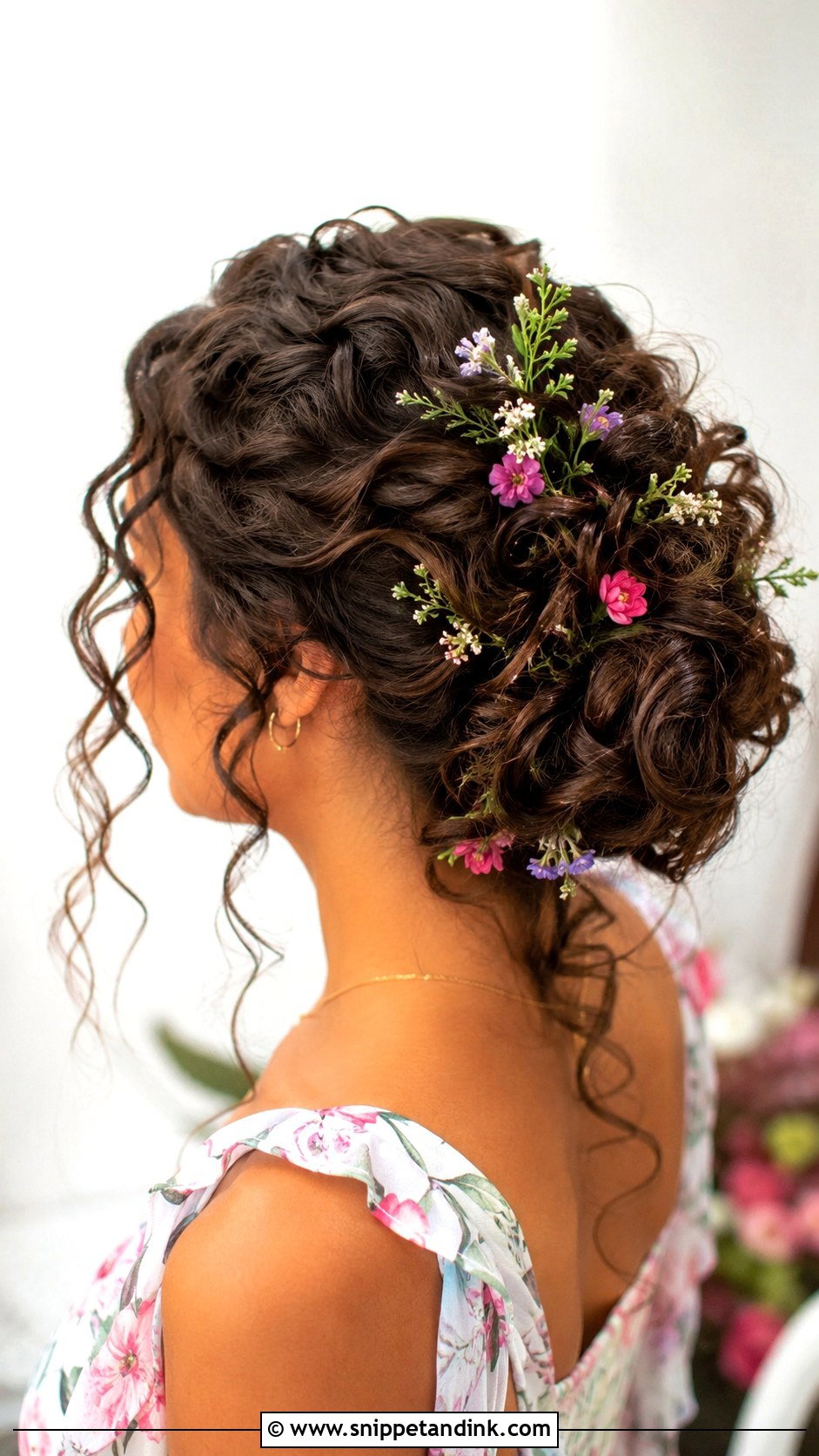 Curly Updo With Flowers - Snippet and Ink - 25 Curly Hairstyles for Wedding Guest