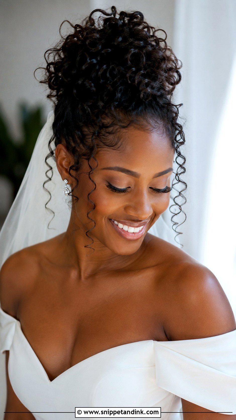 Curly Updo With Tendrils - Snippet and Ink - 25 Glam Wedding Hair Ideas