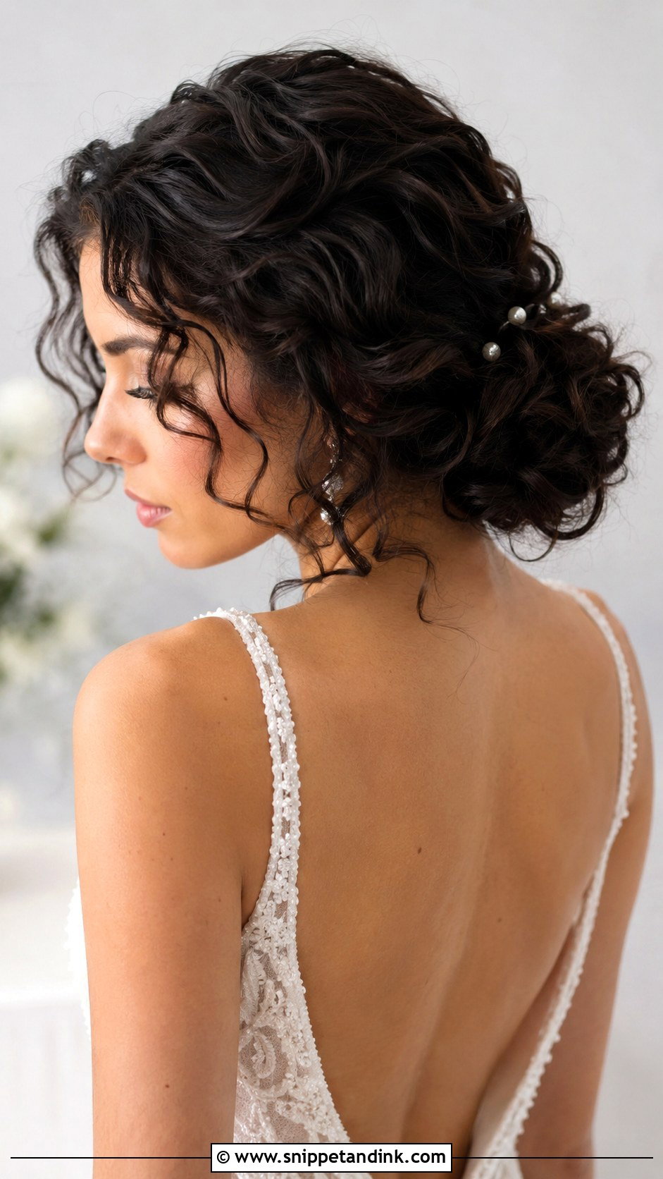 Curly Wedding Low Bun - Snippet and Ink - 20 Fancy Curly Wedding Hairstyles