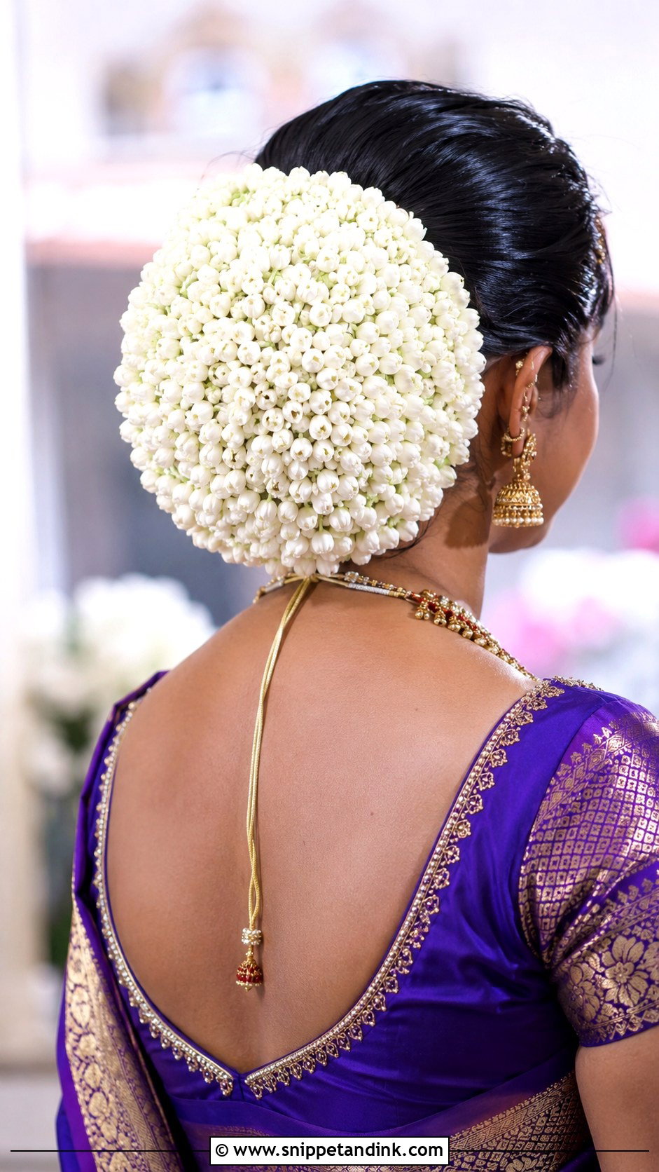 Donut Bun Covered In Jasmine - Snippet and Ink - 20 South Indian Bride Hairstyle with Jasmine Flowers