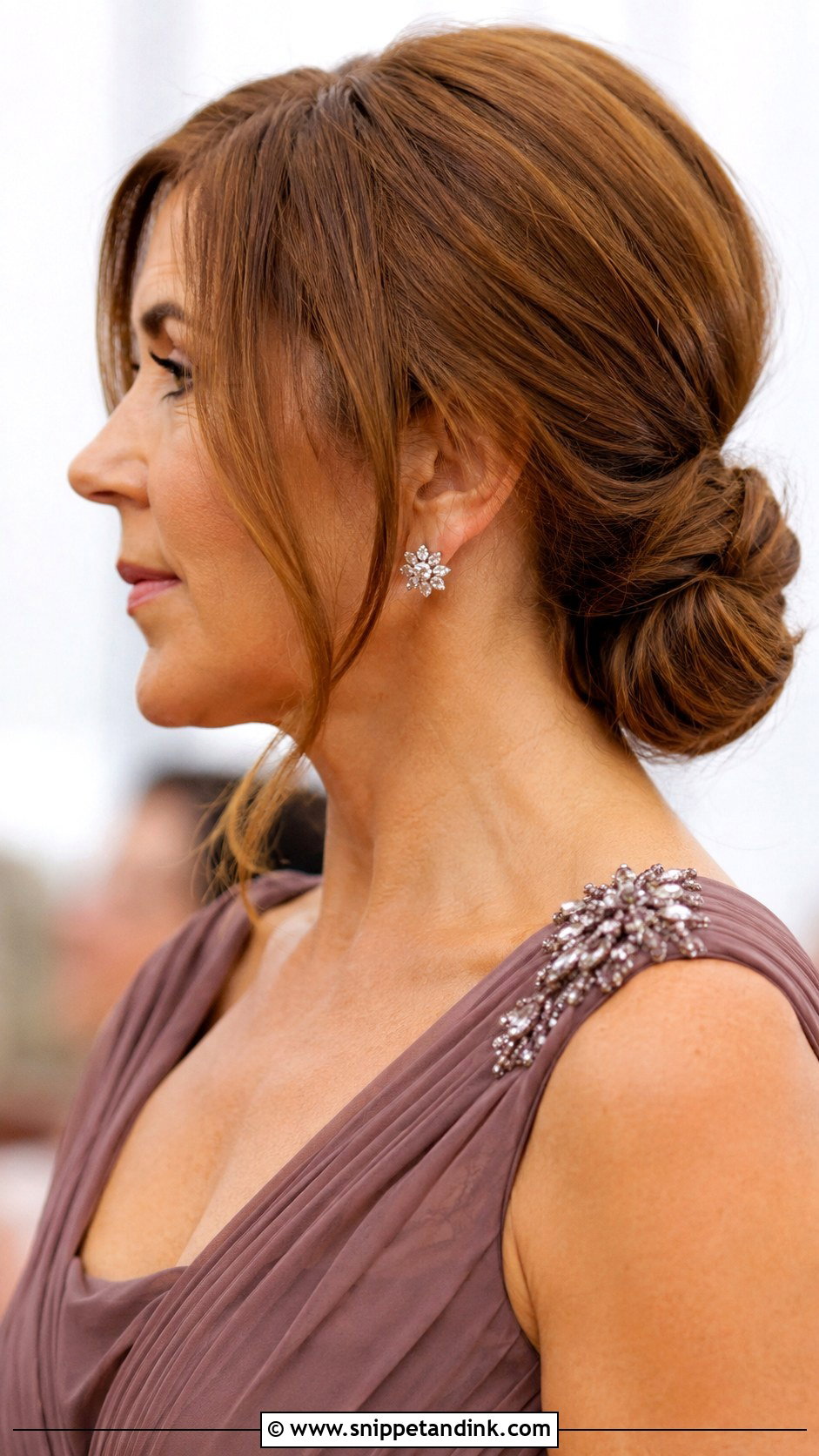 Elegant Low Bun with Face Framing Strands - Snippet and Ink - 20 Mother of Groom Hair Ideas