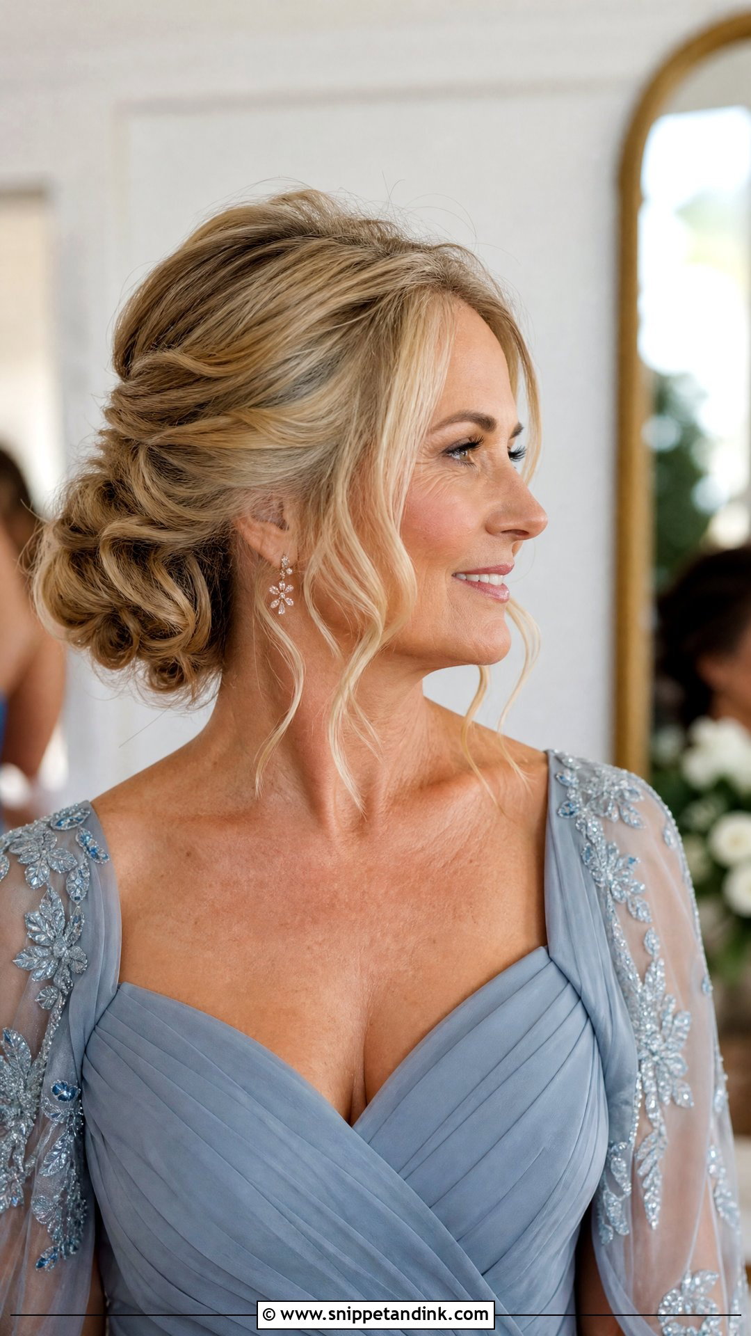 Elegant Low Bun with Loose Strands - Snippet and Ink - 20 Hairstyle for Mother of the Bride Ideas