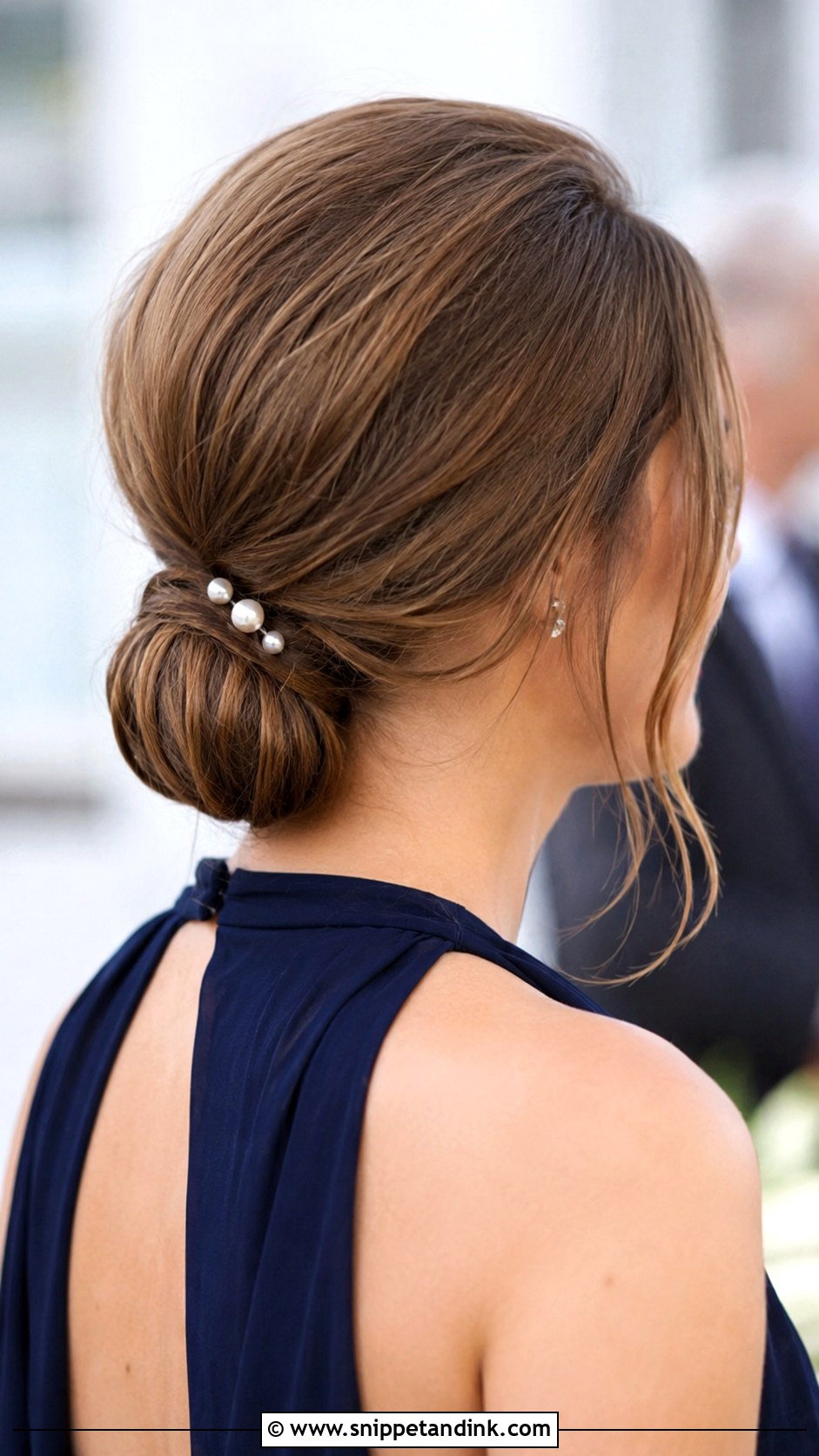 Elegant Low Chignon - Snippet and Ink - 30 Mother of the Groom Hairstyles