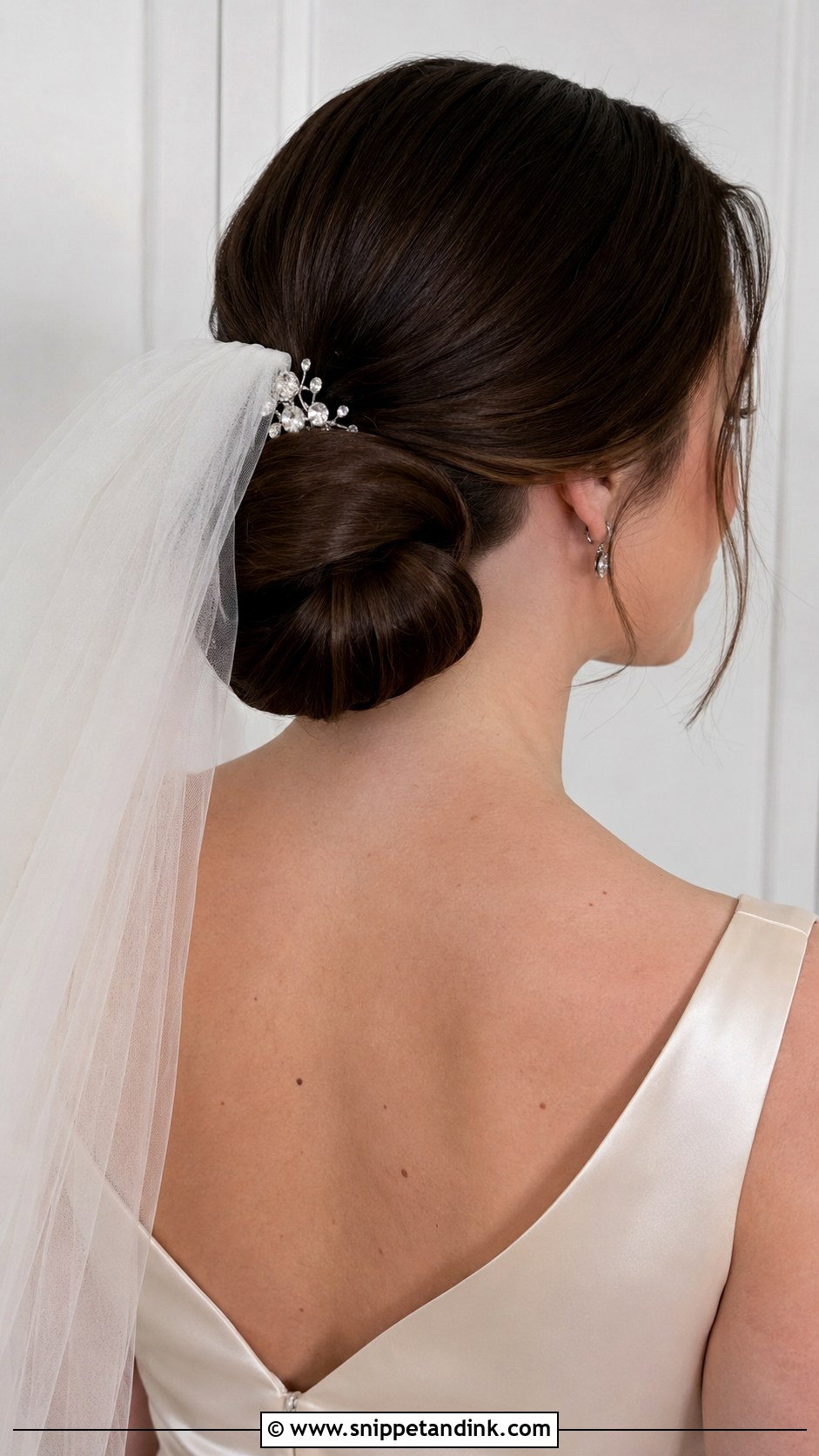 Elegant Rolled Chignon - Snippet and Ink - 20 Updo Wedding Hairstyles for Short Hair