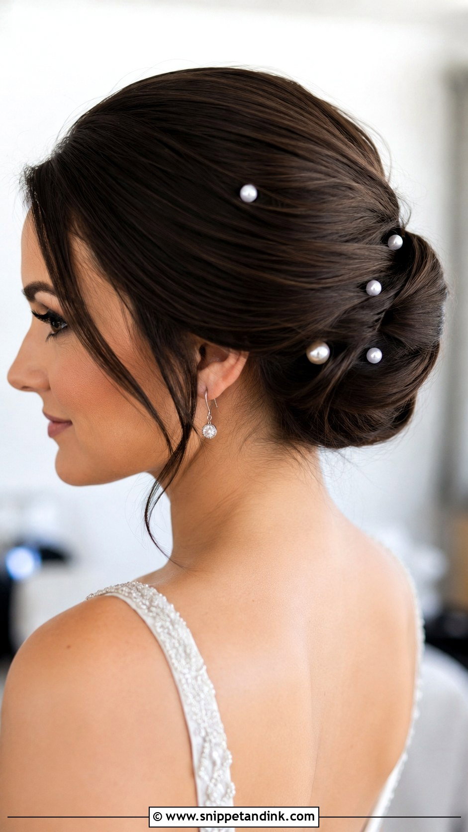 Elegant Updo With Pearl Accents - Snippet and Ink - 30 Hair Looks for Wedding Guest