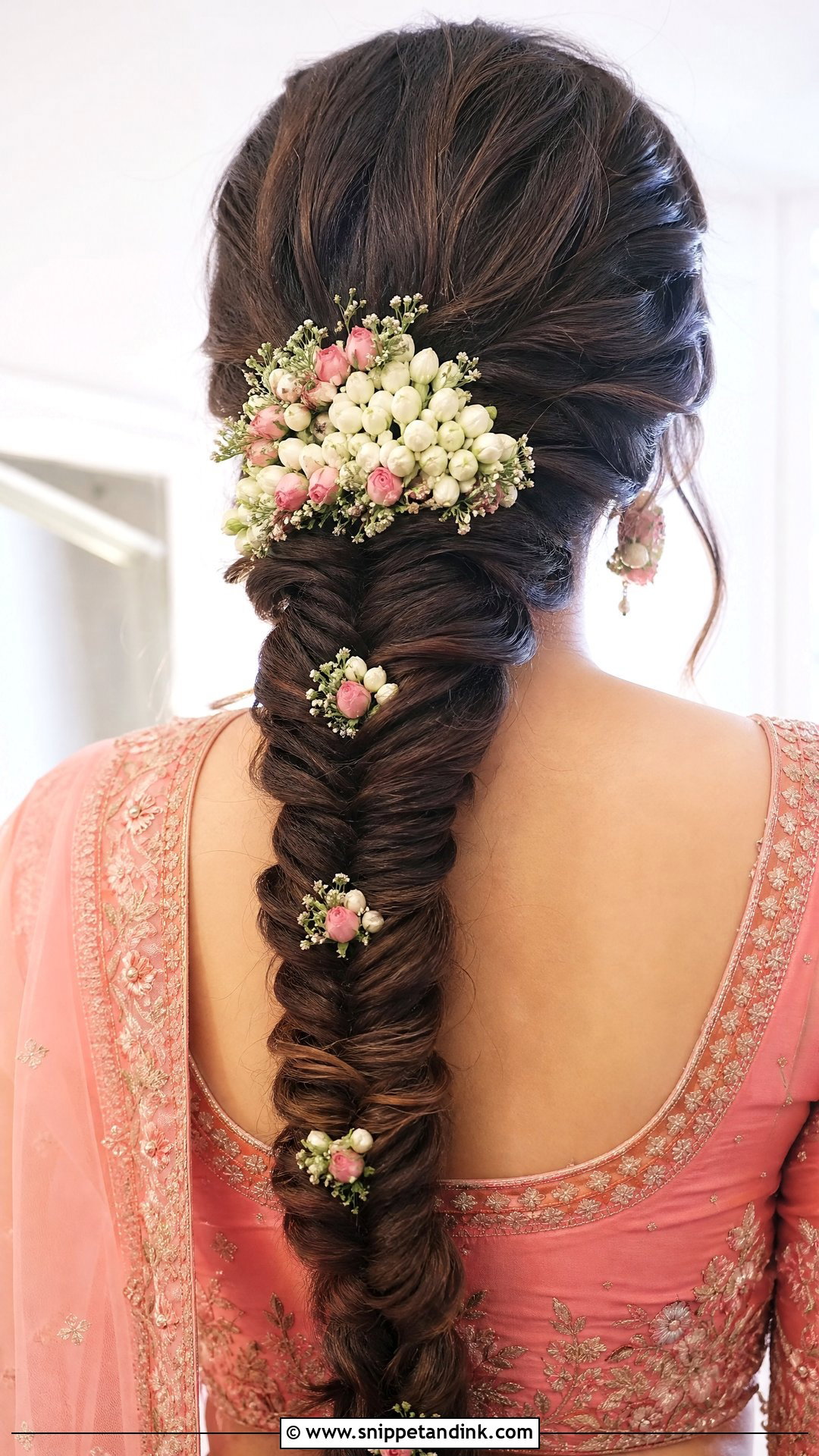 Fishtail Braid With Floral Accents - Snippet and Ink - 20 Hairstyles for South Indian Wedding