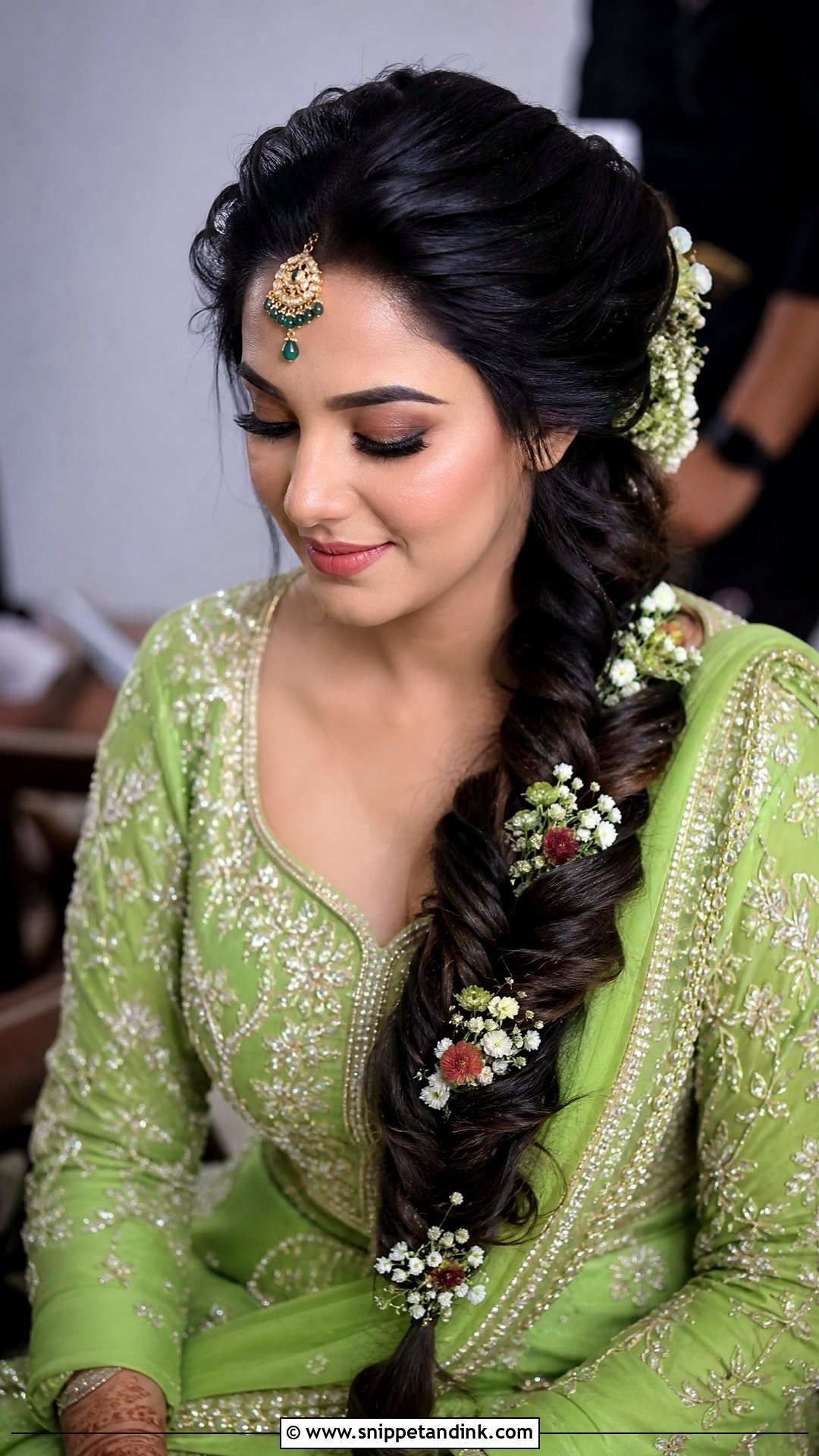 Fishtail Braid With Flowers - Snippet and Ink - 20 Punjabi Bride Hairstyle Ideas