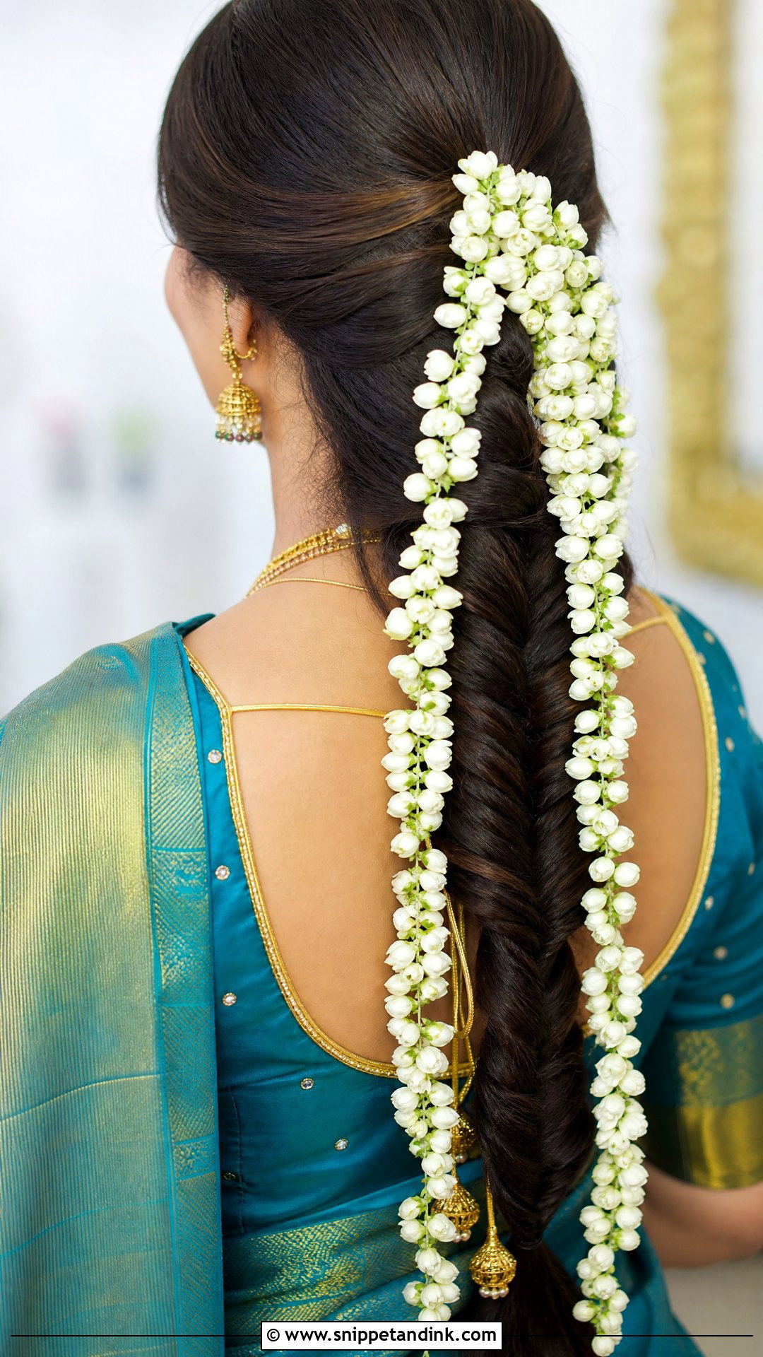 Fishtail Braid With Jasmine - Snippet and Ink - 20 South Indian Bridal Hair Ideas