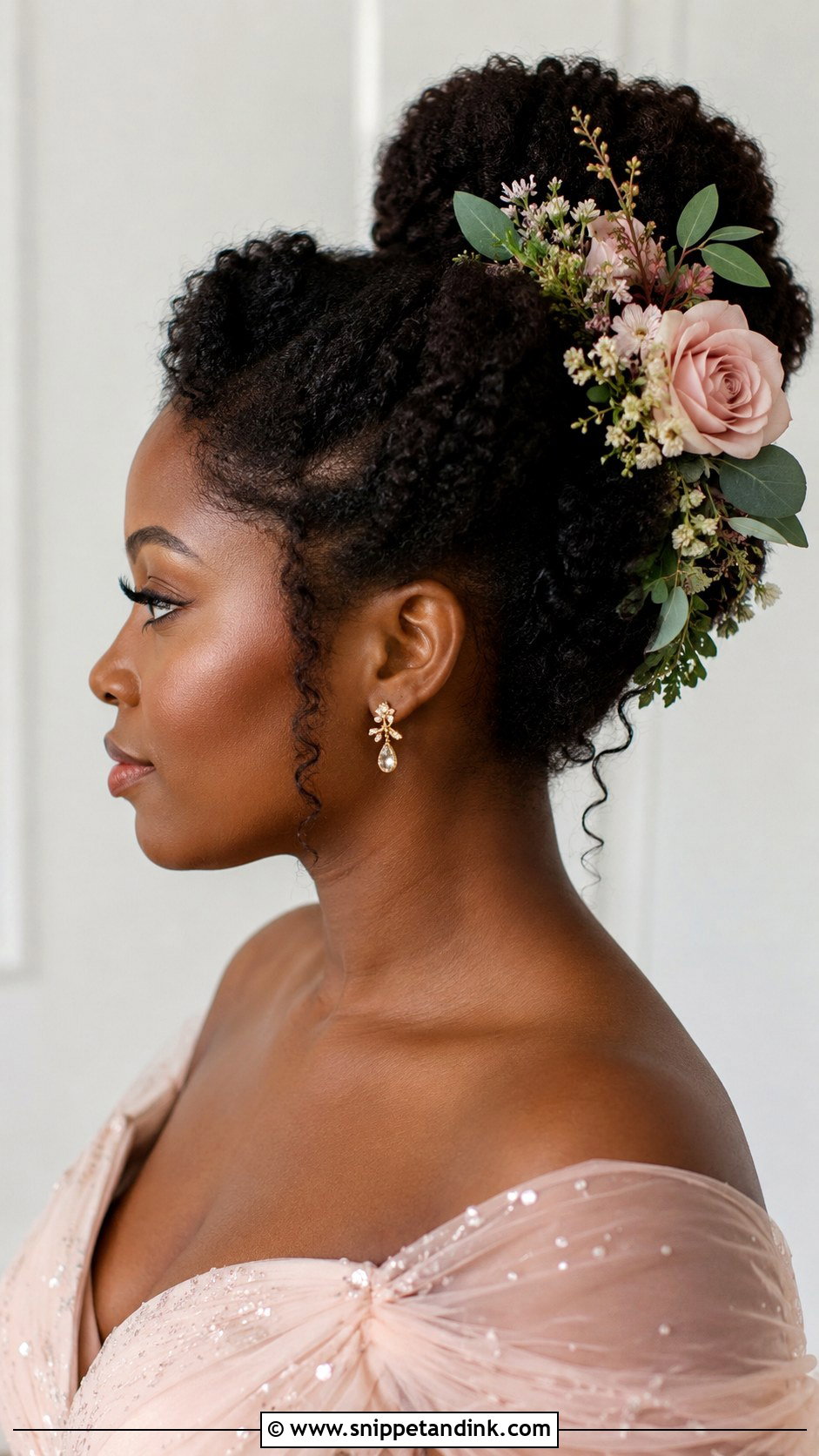 Floral Accented Bun for Black Women - Snippet and Ink - 25 Wedding Guest Hairstyles Black Women