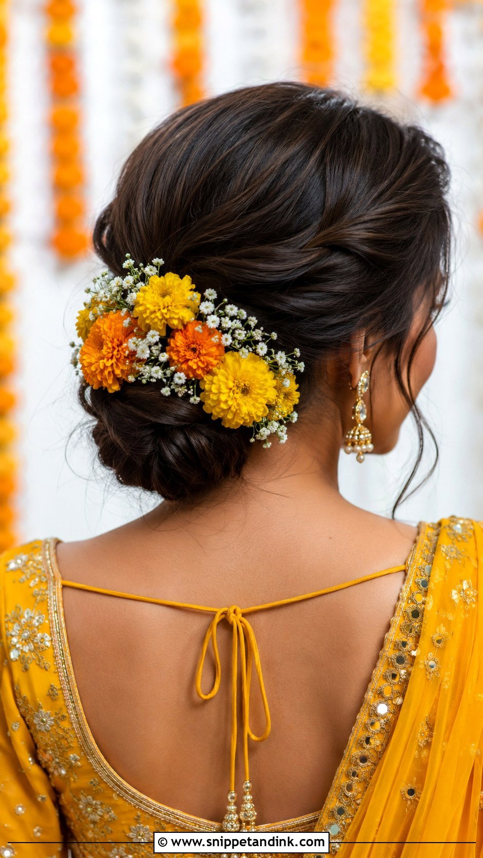 Floral Bun Hairstyle for Mehndi - Snippet and Ink - 30 Mehndi Hairstyles for Bride