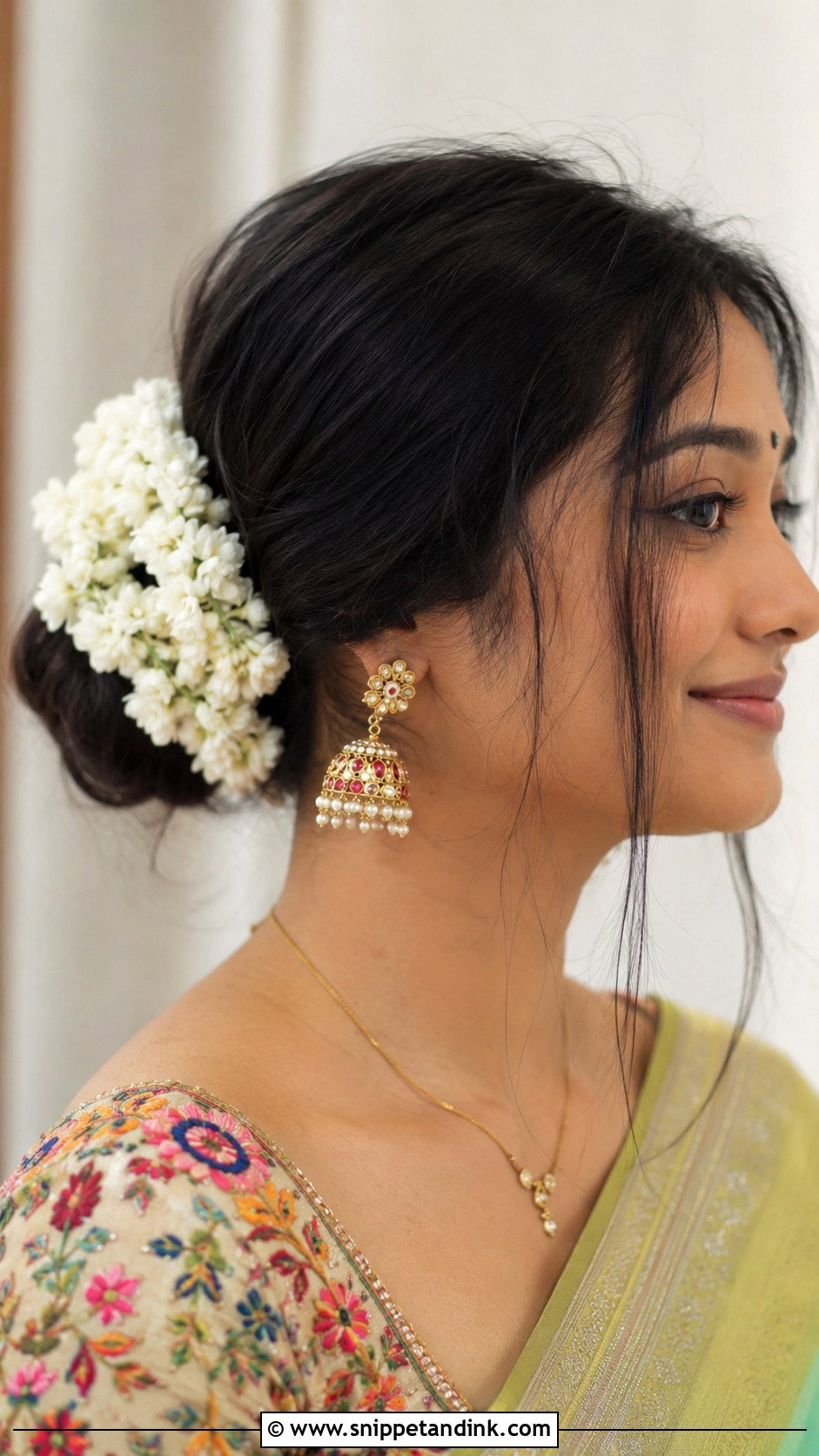 Floral Bun With Gajra - Snippet and Ink - 25 Mehndi Hairstyles for Bride Sister