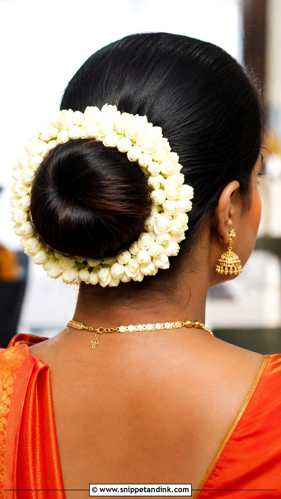 Floral Bun With Gajra Wrap - Snippet and Ink - 25 South Indian Bride Engagement Hairstyle Ideas
