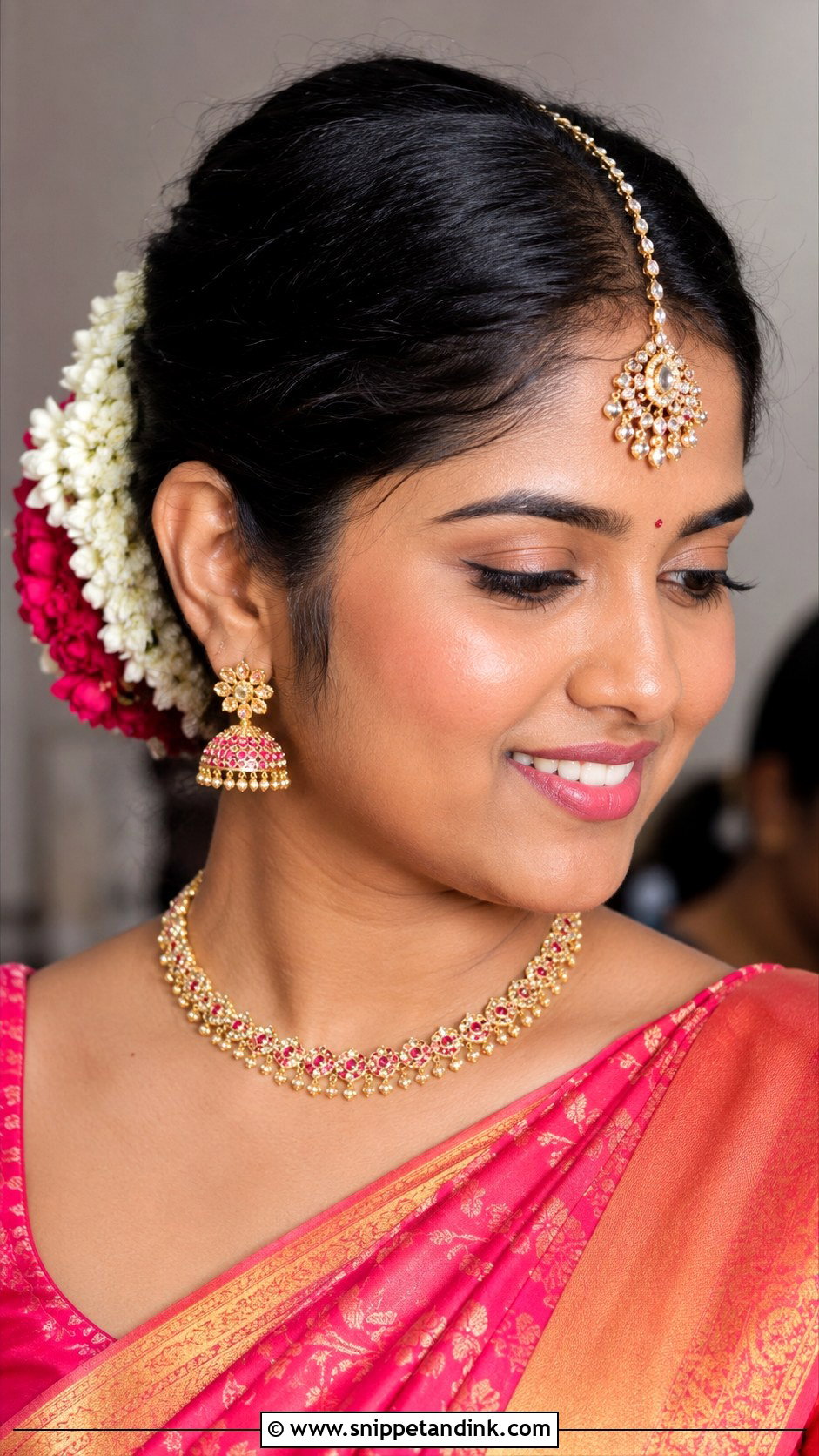 Floral Bun With Maang Tikka - Snippet and Ink - 20 Valaikappu Hairstyles