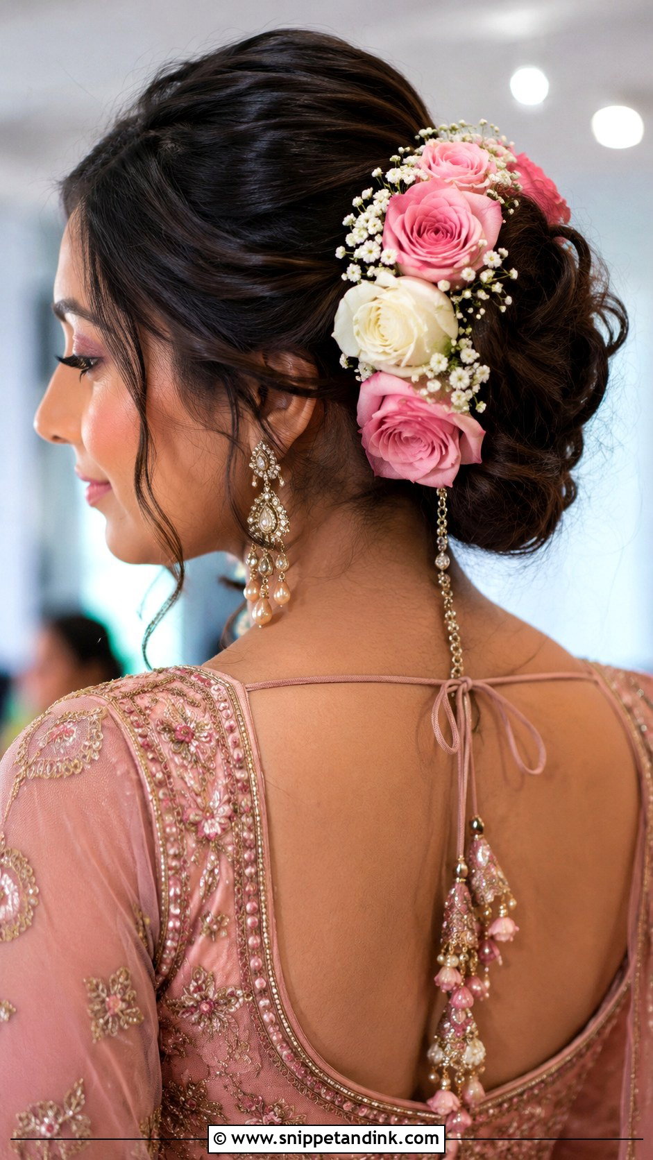 Floral Bun With Roses - Snippet and Ink - 25 Indian Wedding Bun Hairstyles